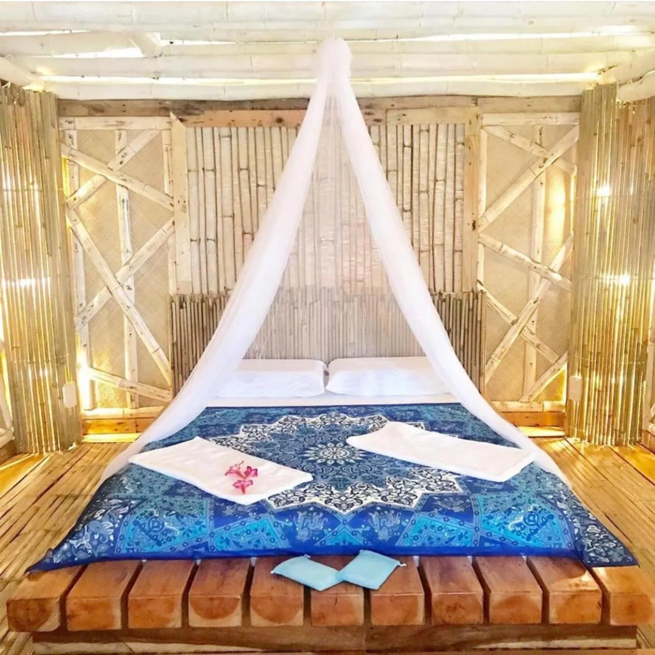 Bed in Nature's Eye Resort