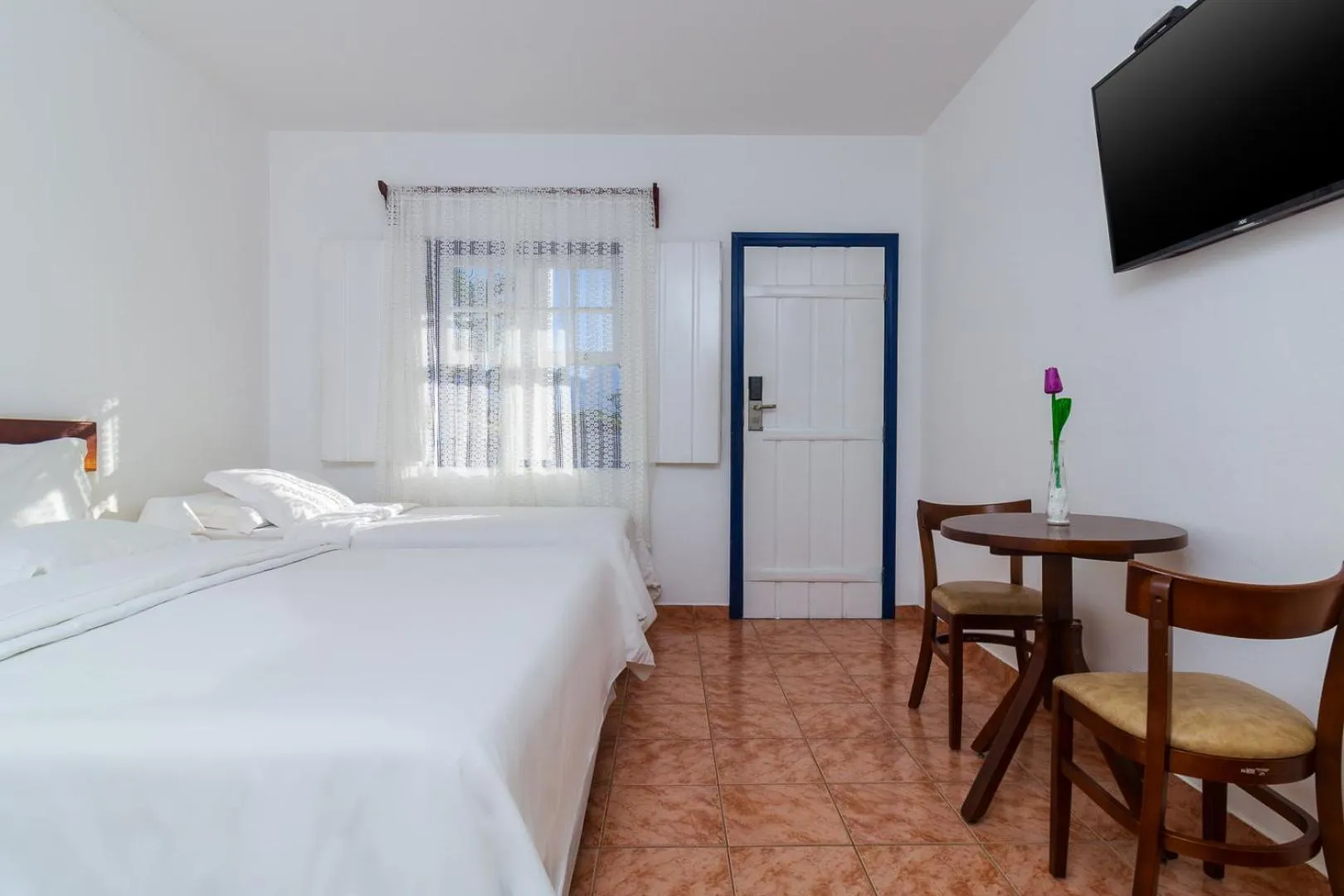 Bed in Pousada Aconchego