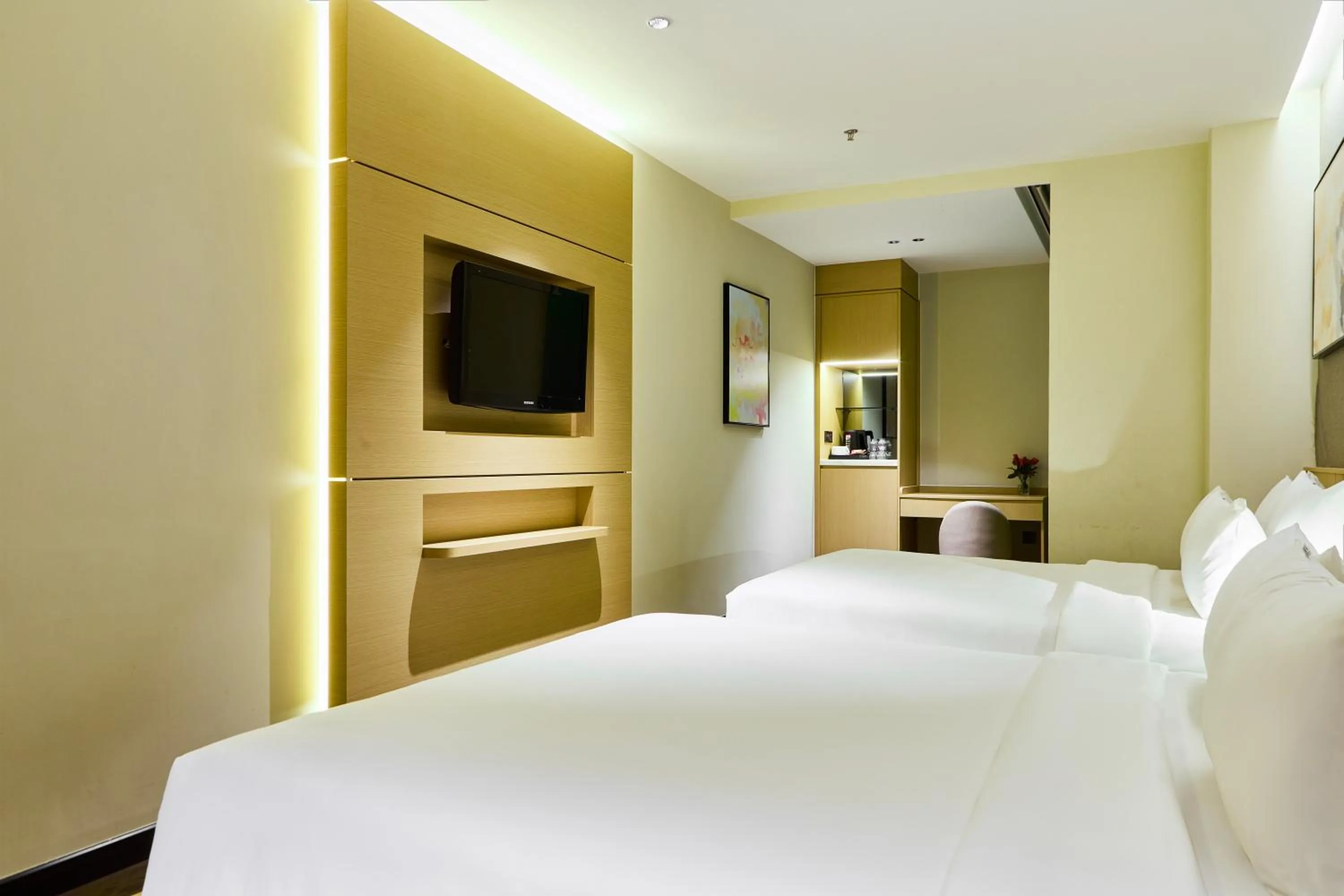 Bed in Central Park Saigon Hotel