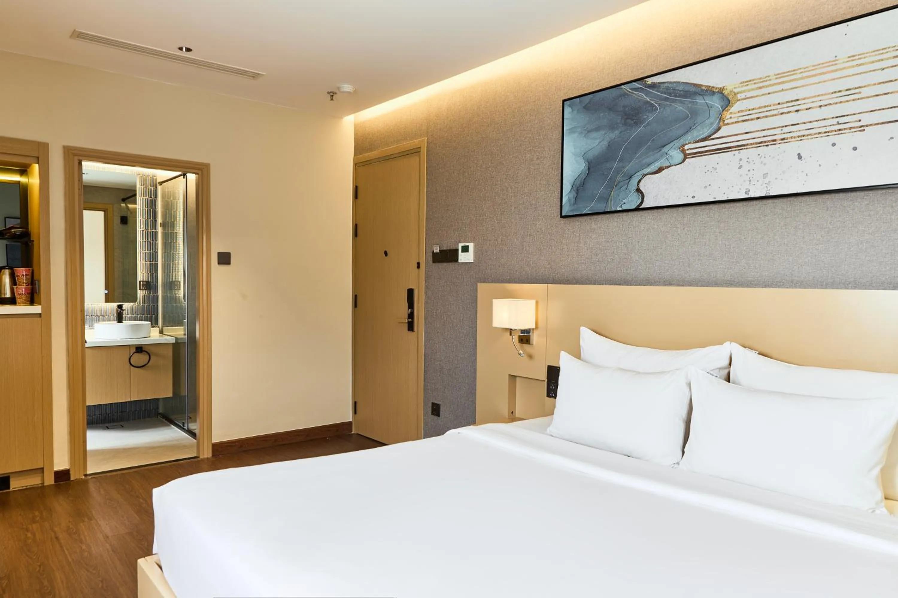 Bed in Central Park Saigon Hotel