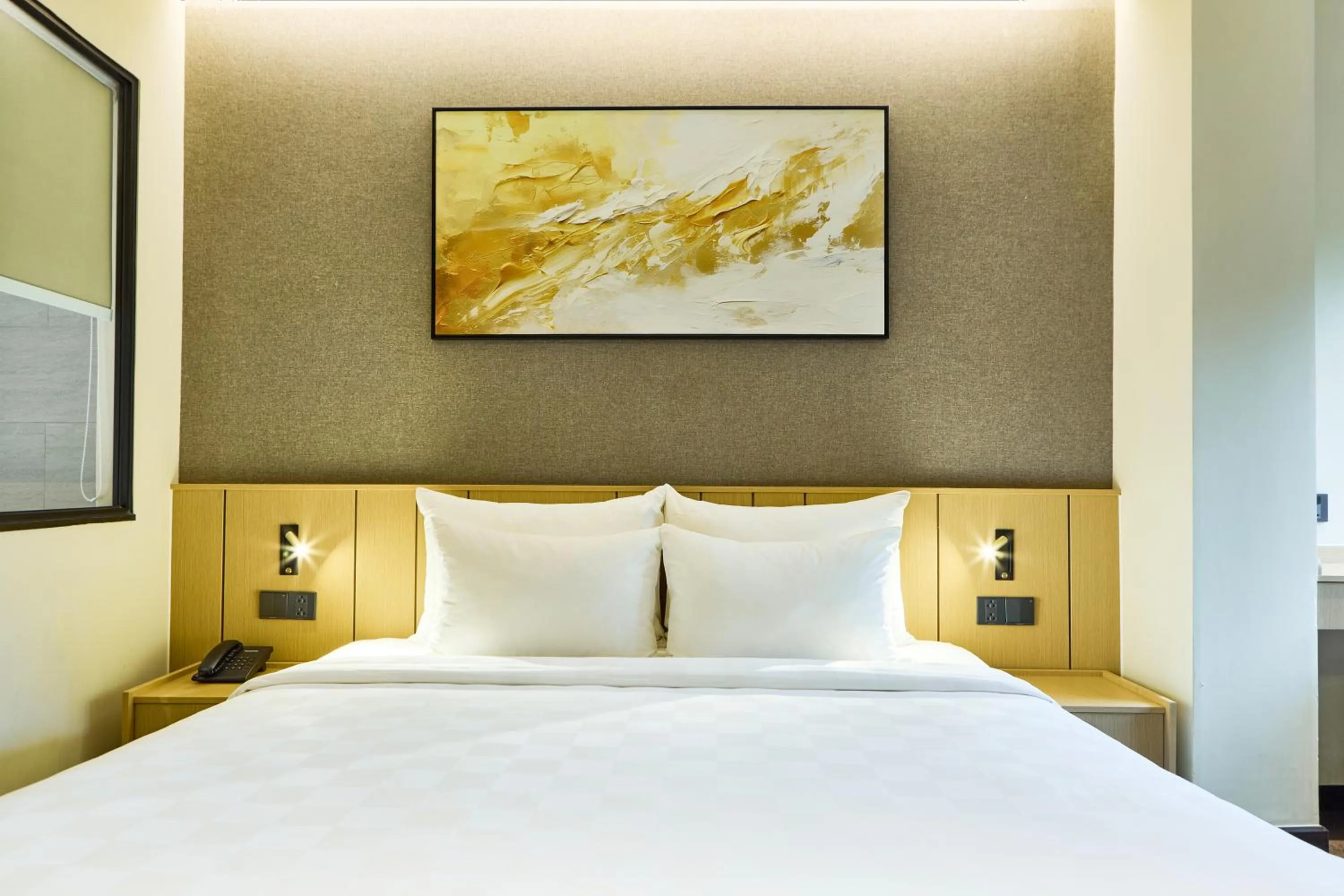 Bed in Central Park Saigon Hotel