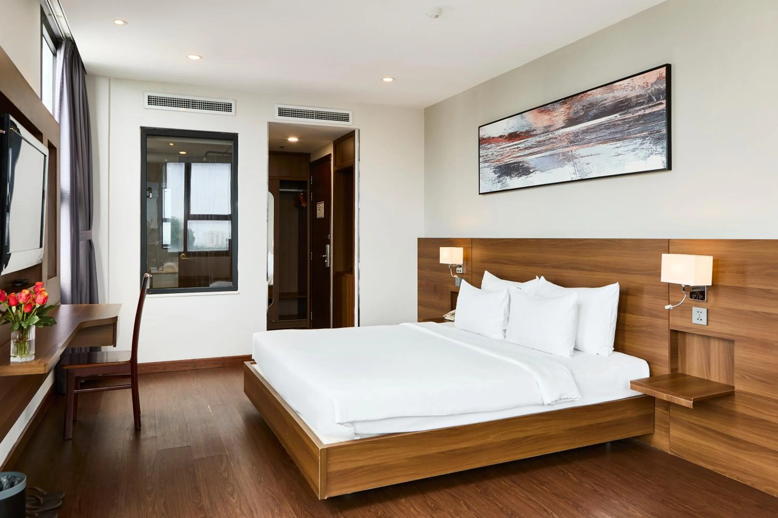 Bed in Central Park Saigon Hotel