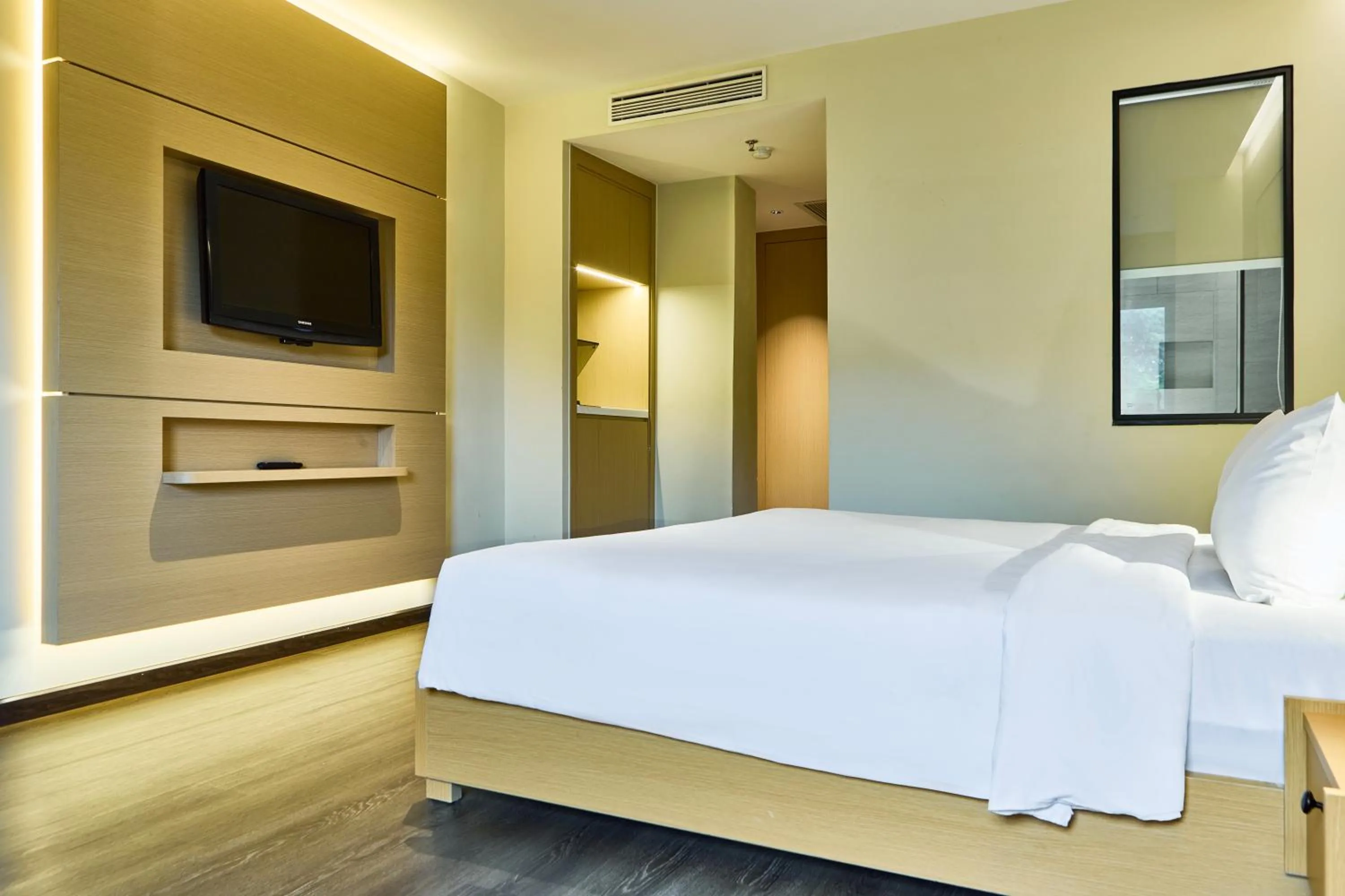 Bed in Central Park Saigon Hotel