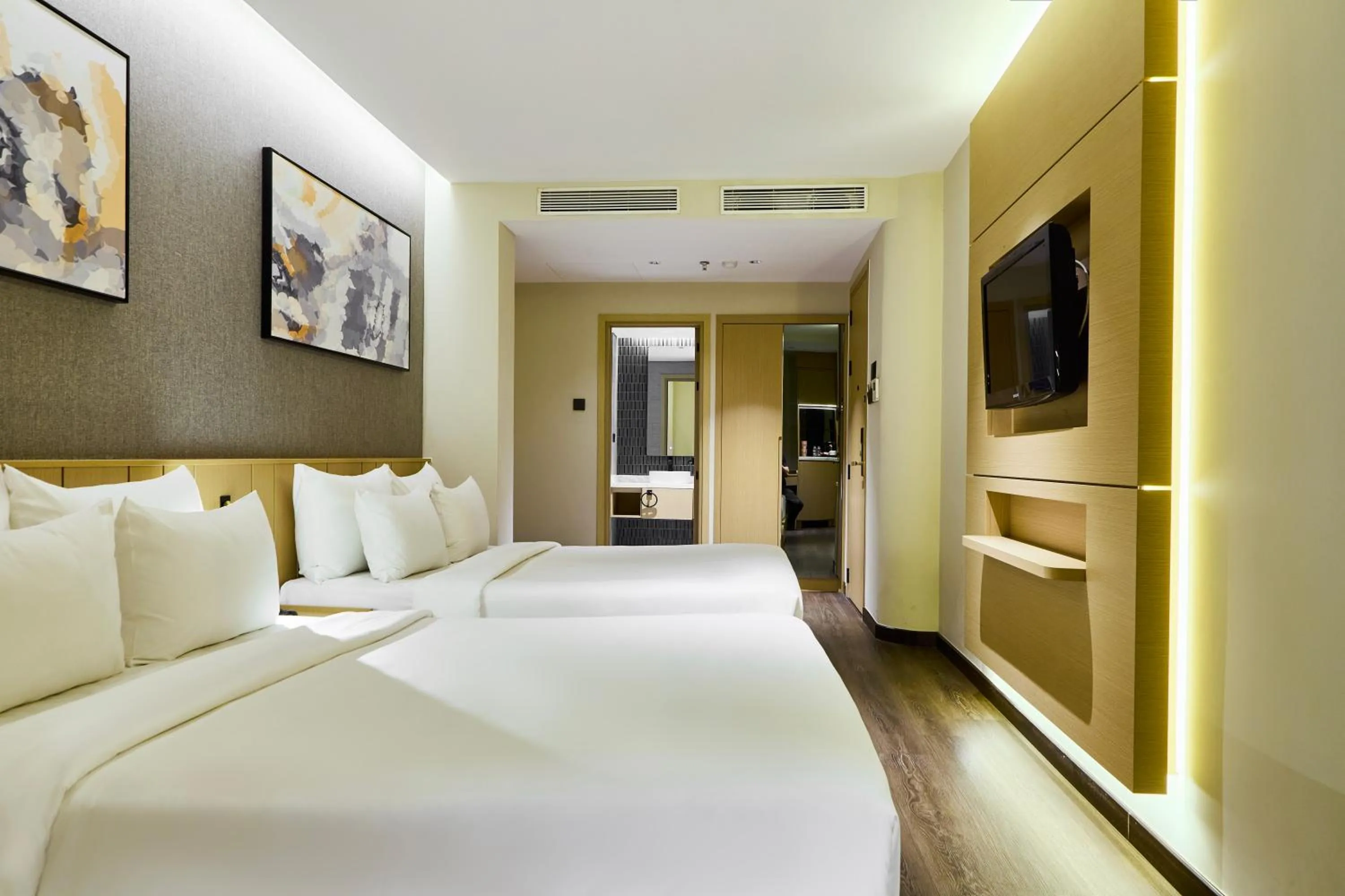 Bed in Central Park Saigon Hotel