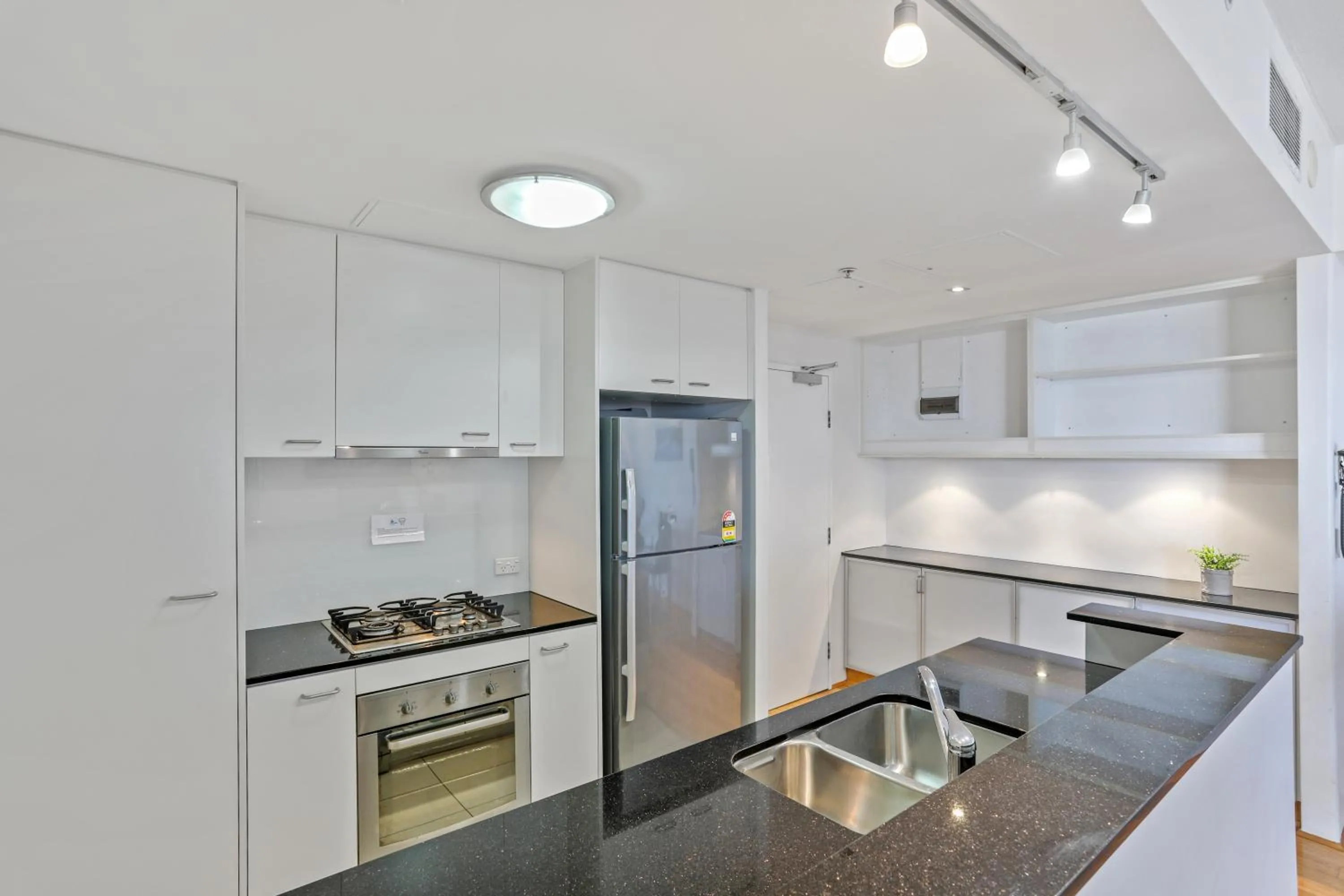 Kitchen or kitchenette in Tweed Ultima Apartments