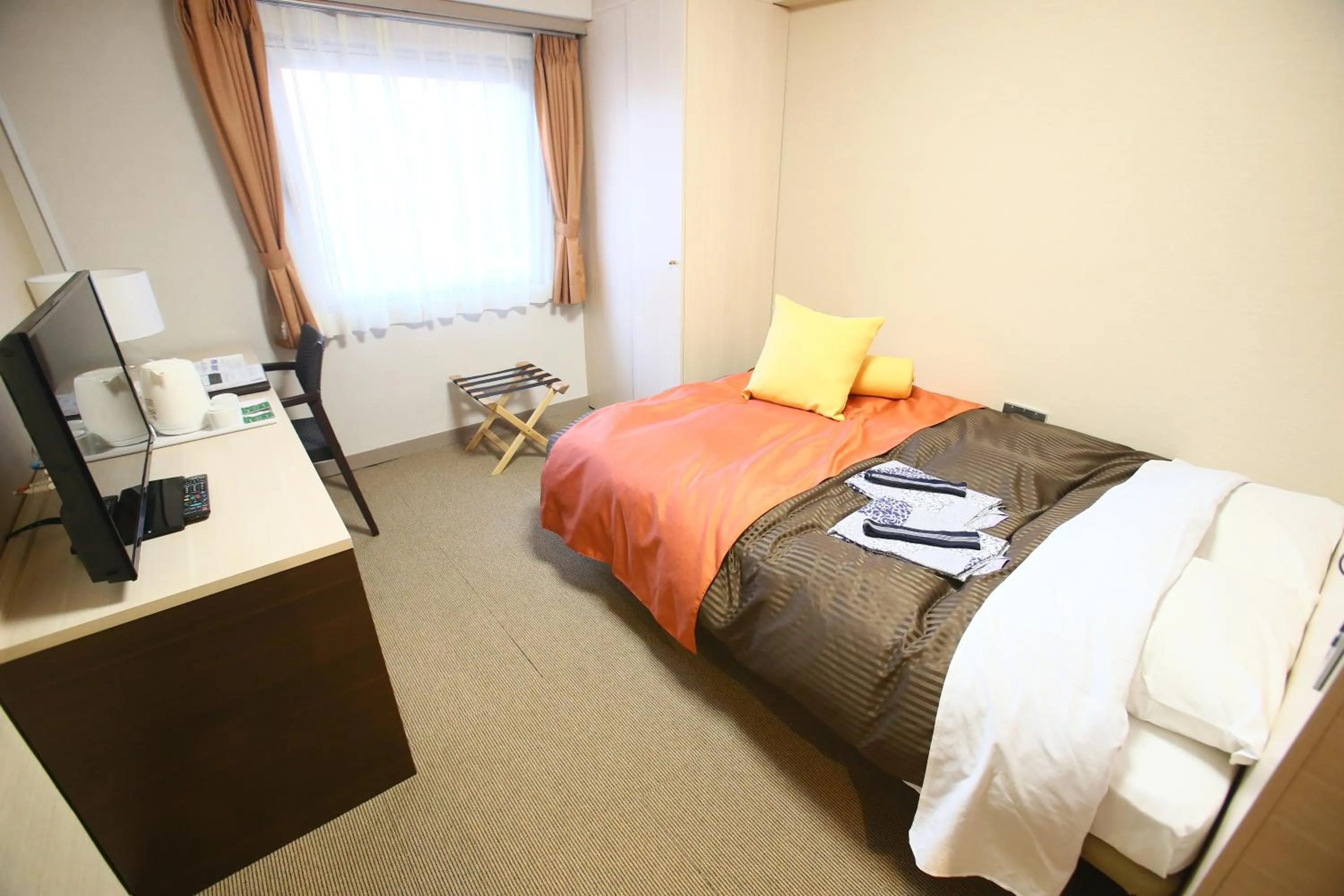 Bed in Hotel 1-2-3 Maebashi Mercury