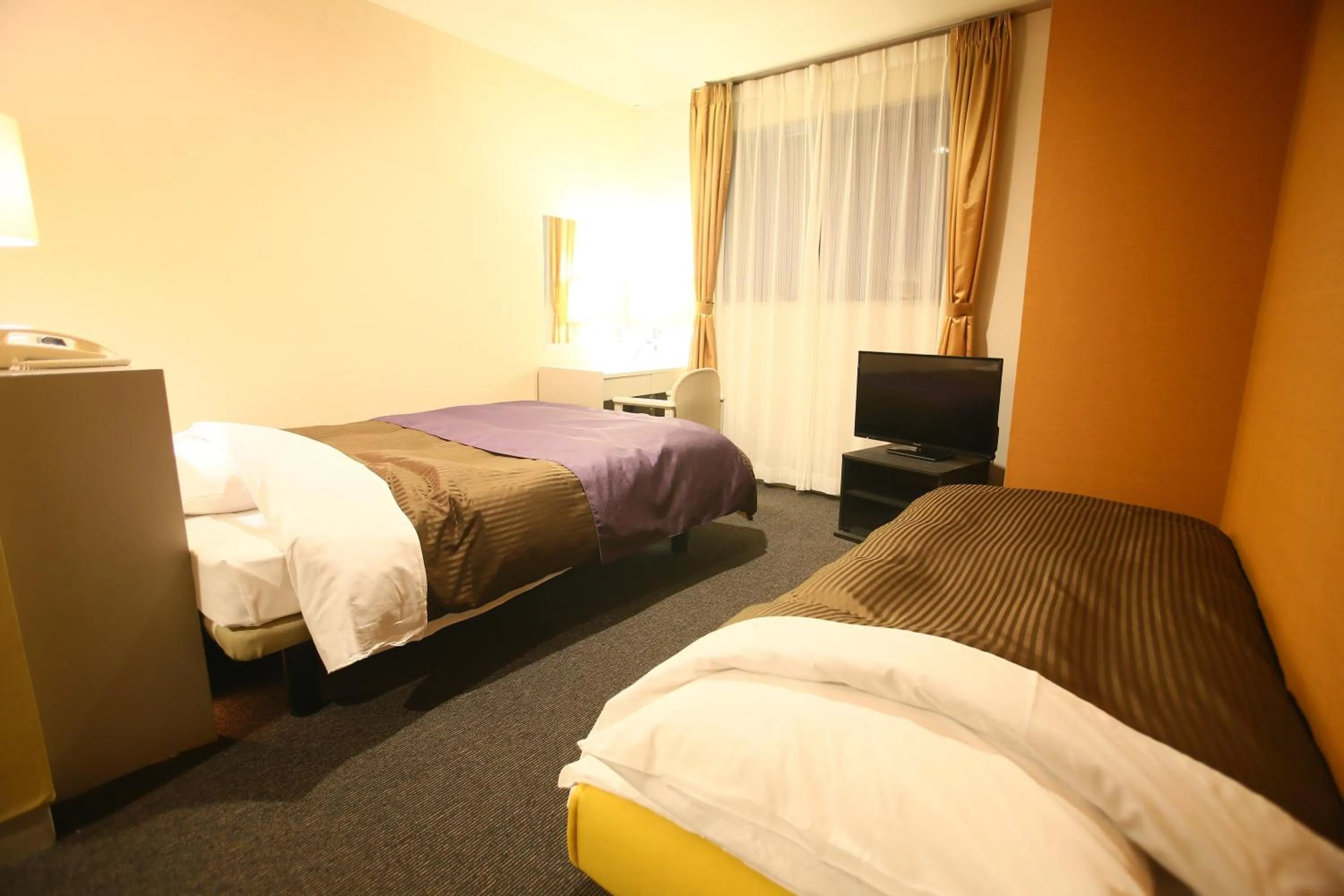 Bed in Hotel 1-2-3 Maebashi Mercury