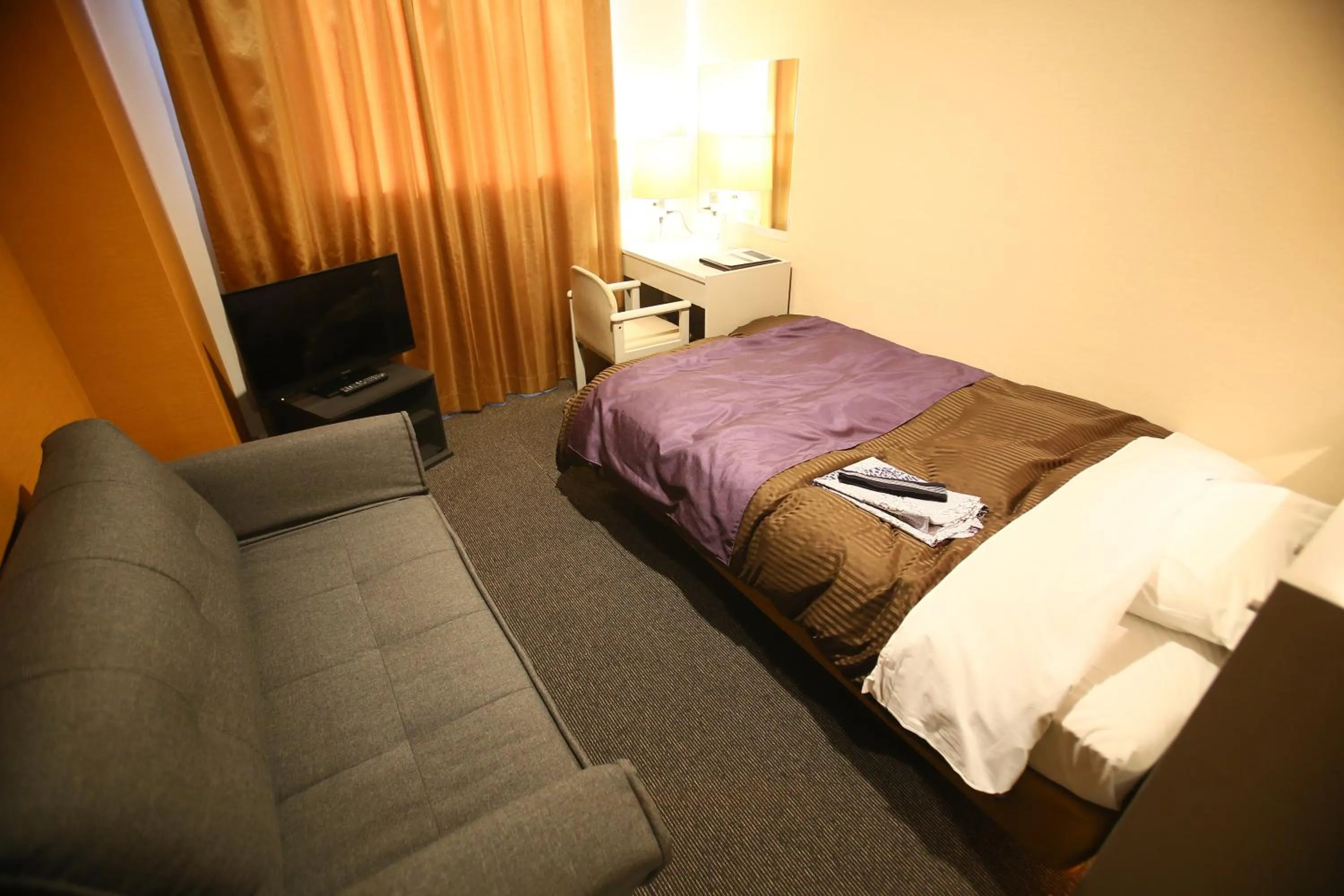 Bed in Hotel 1-2-3 Maebashi Mercury