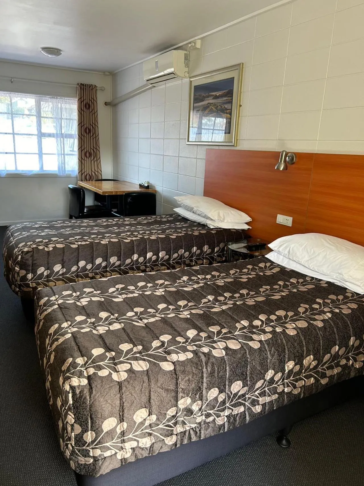 Bed in Tudor Motor Lodge