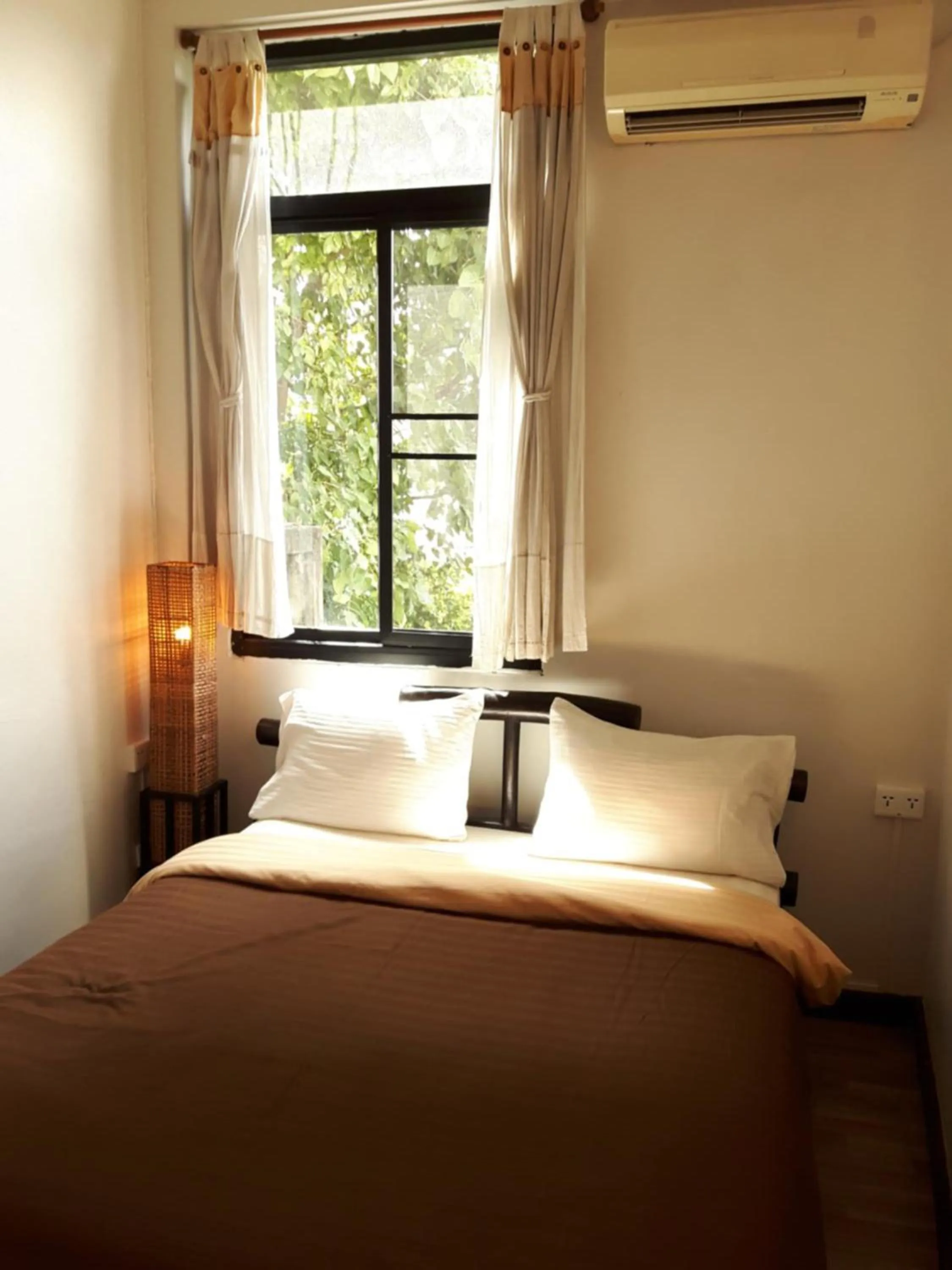 Bed in Lamphuhouse Bangkok