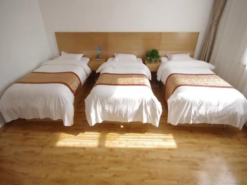 Bed in GreenTree Inn Shandong Laiwu Bus Station Express Hotel