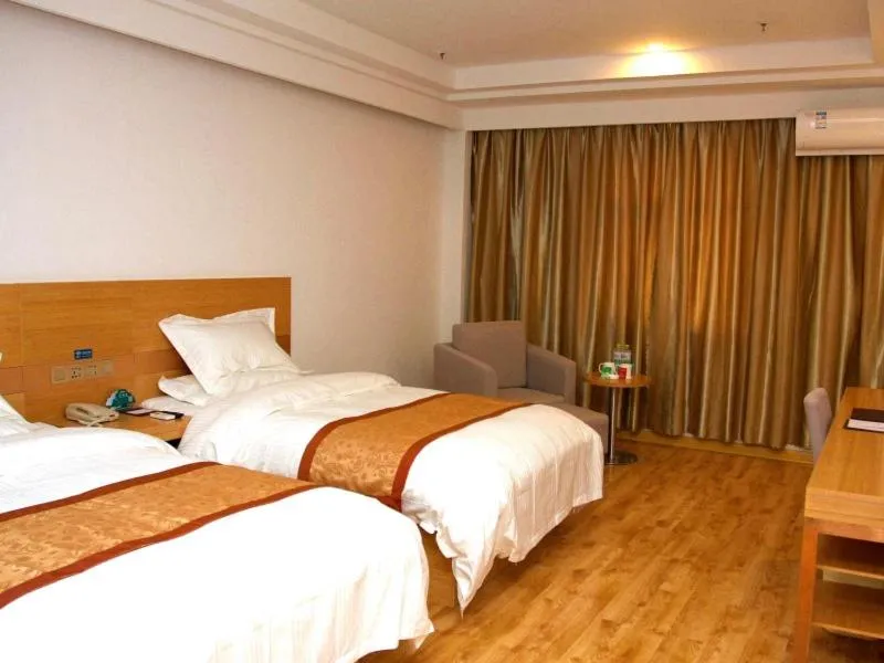 Bed in GreenTree Inn Shandong Laiwu Bus Station Express Hotel