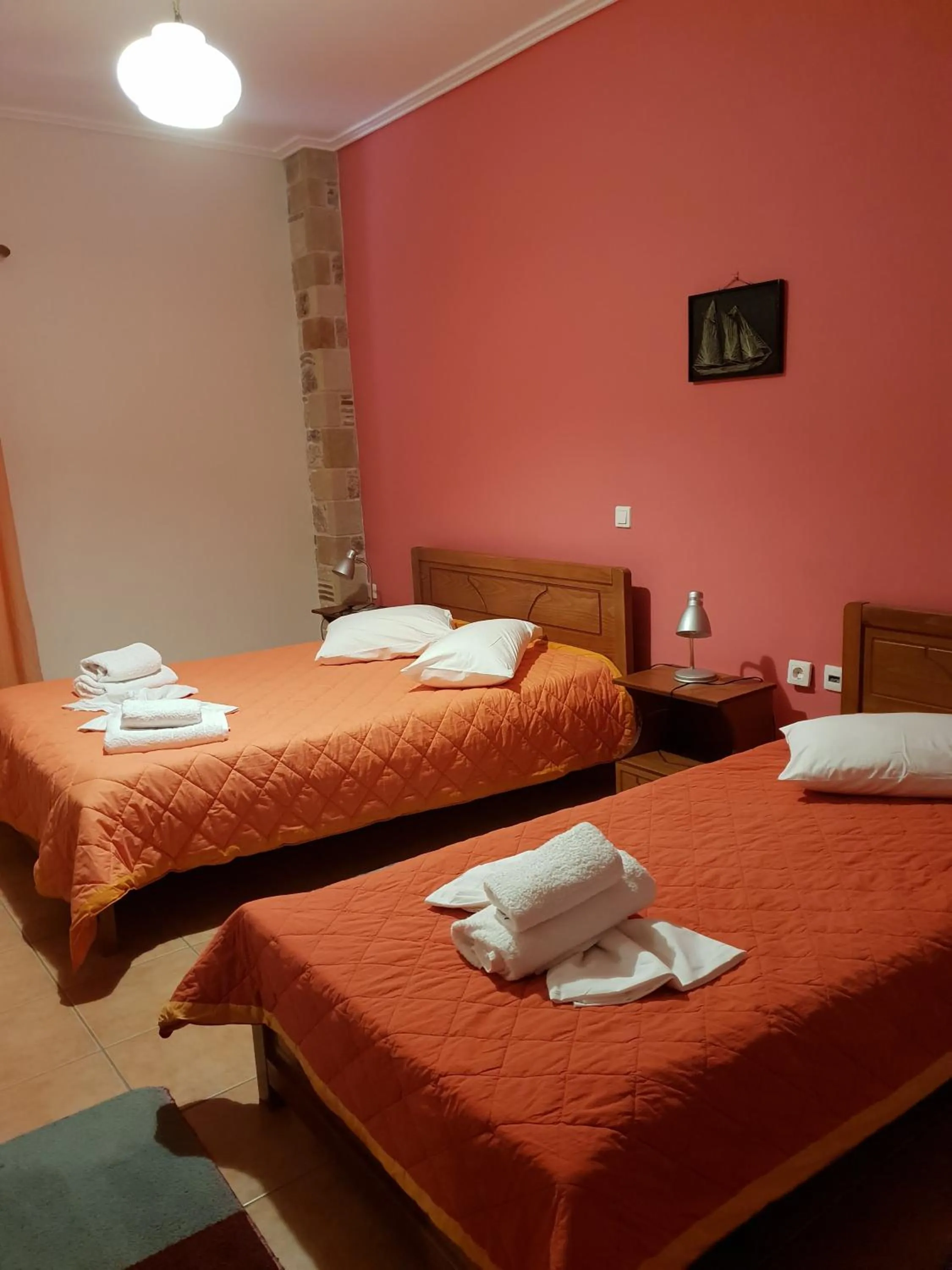 Bed in Aktaion Hotel