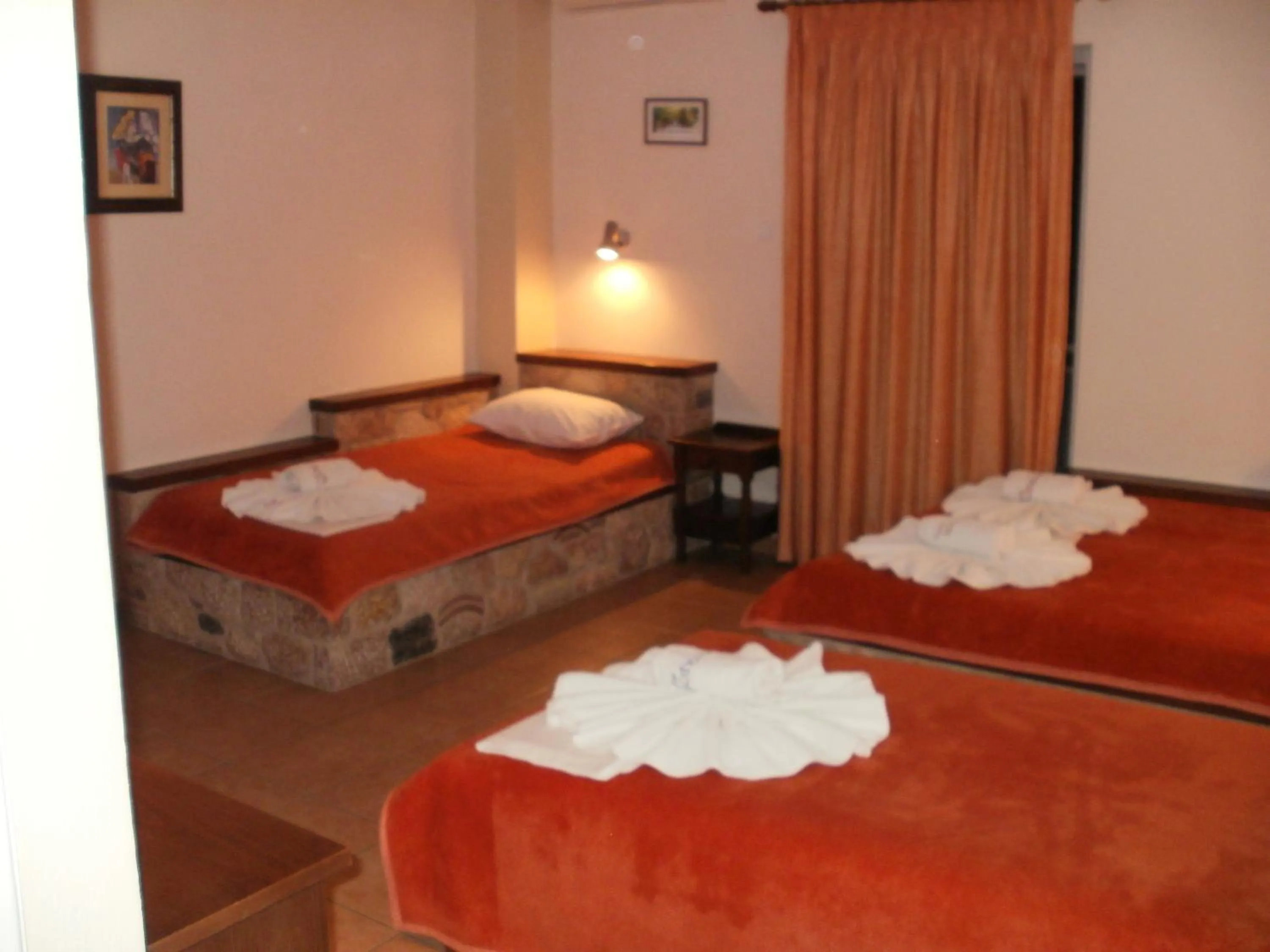 Bed in Aktaion Hotel