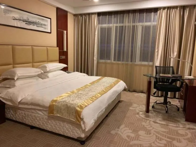 Bed in GreenTree Alliance Suzhou Taicang South Changchun Road Liuyuan Hotel