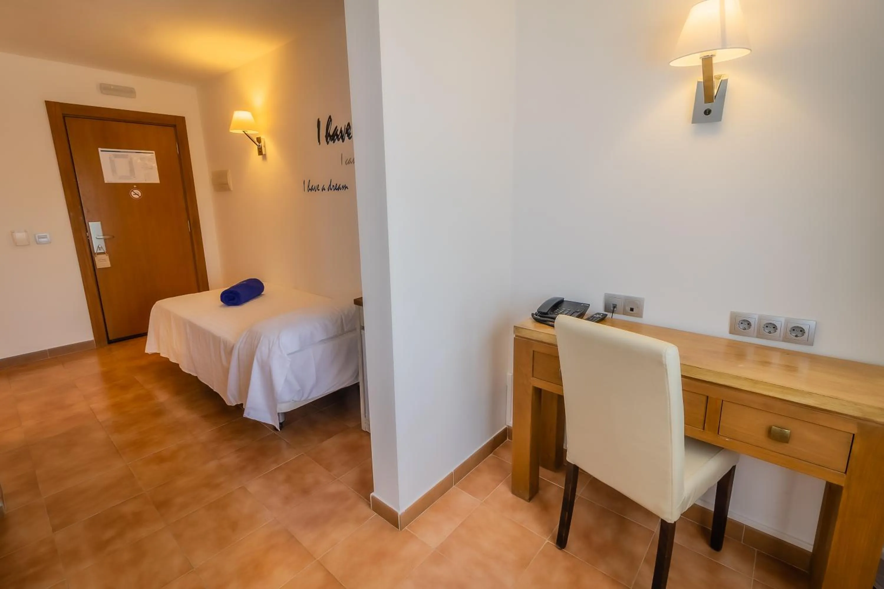 Bed in Paloma Blanca Boutique Hotel