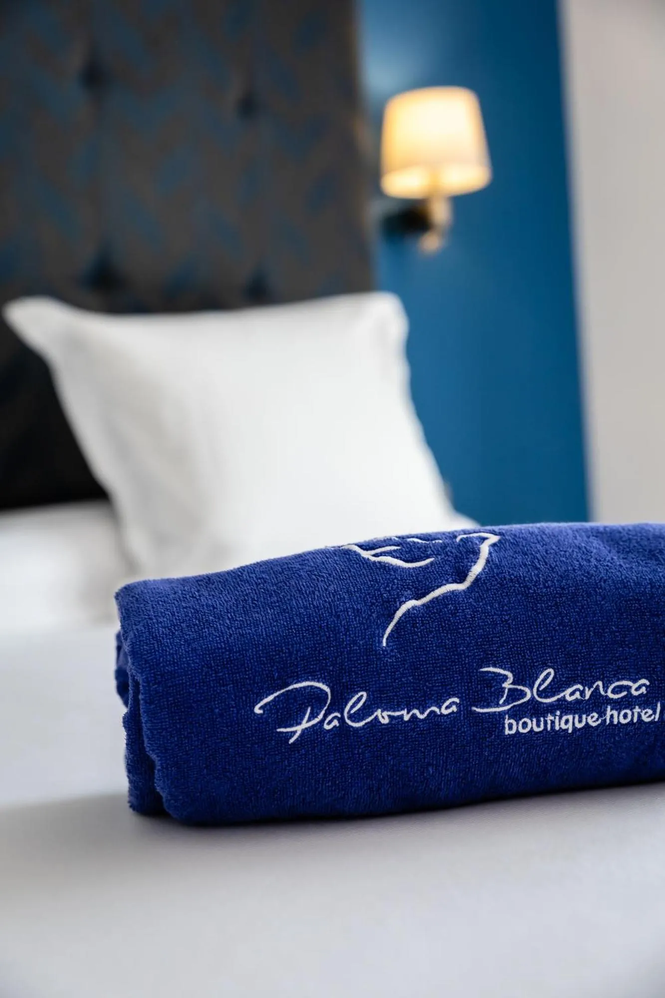 Bed in Paloma Blanca Boutique Hotel