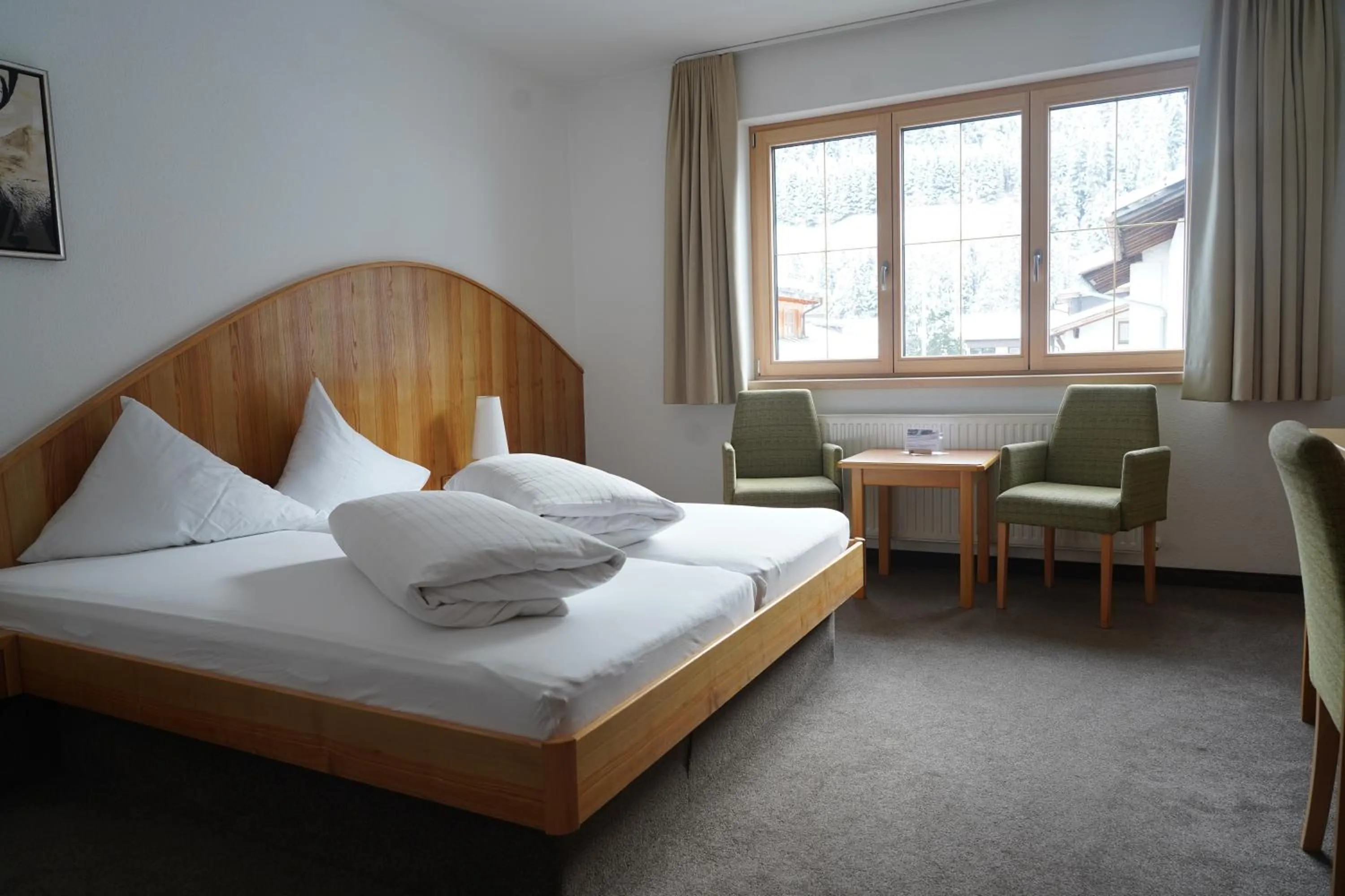 Bedroom, Bed in Quality Hosts Arlberg - Hotel Goldenes Kreuz B&B