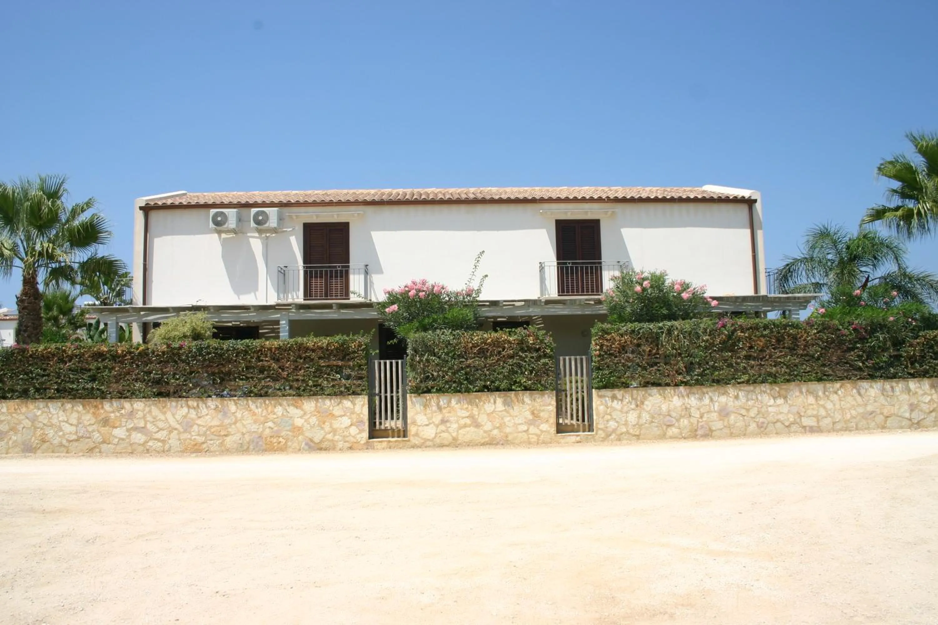 Property building in Oasi Guzzetta Hotel&Case Vacanze