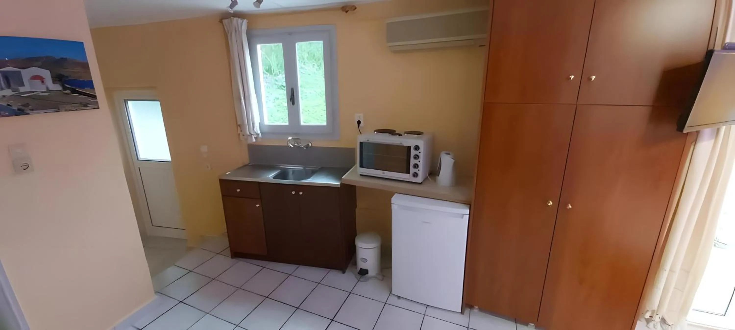Kitchen or kitchenette in Elefteria Hotel