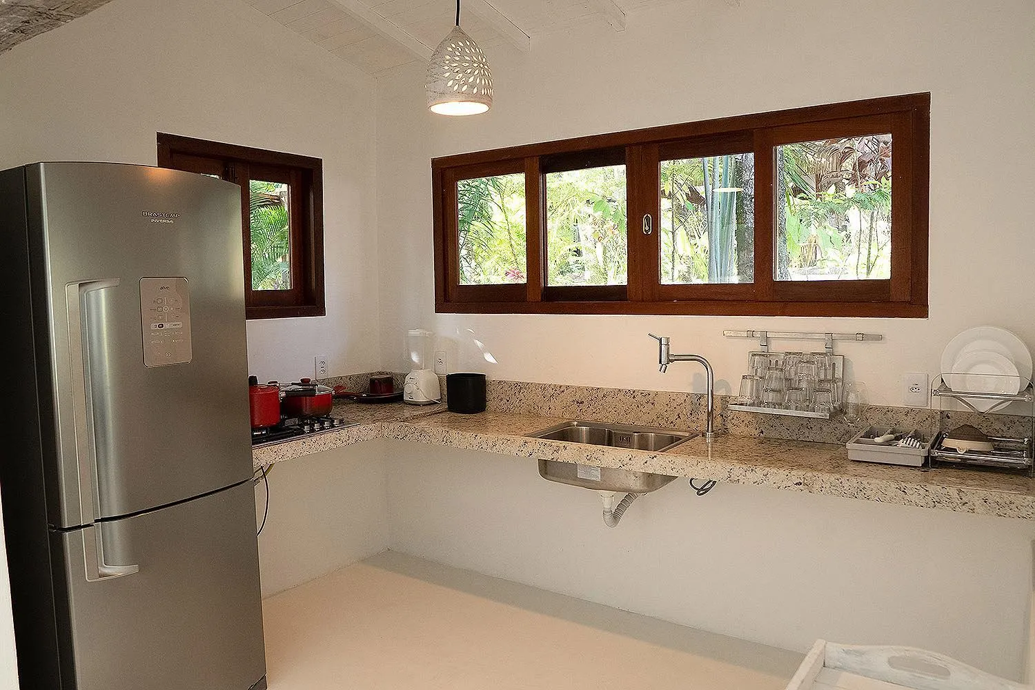 Kitchen or kitchenette in Pousada Calypso