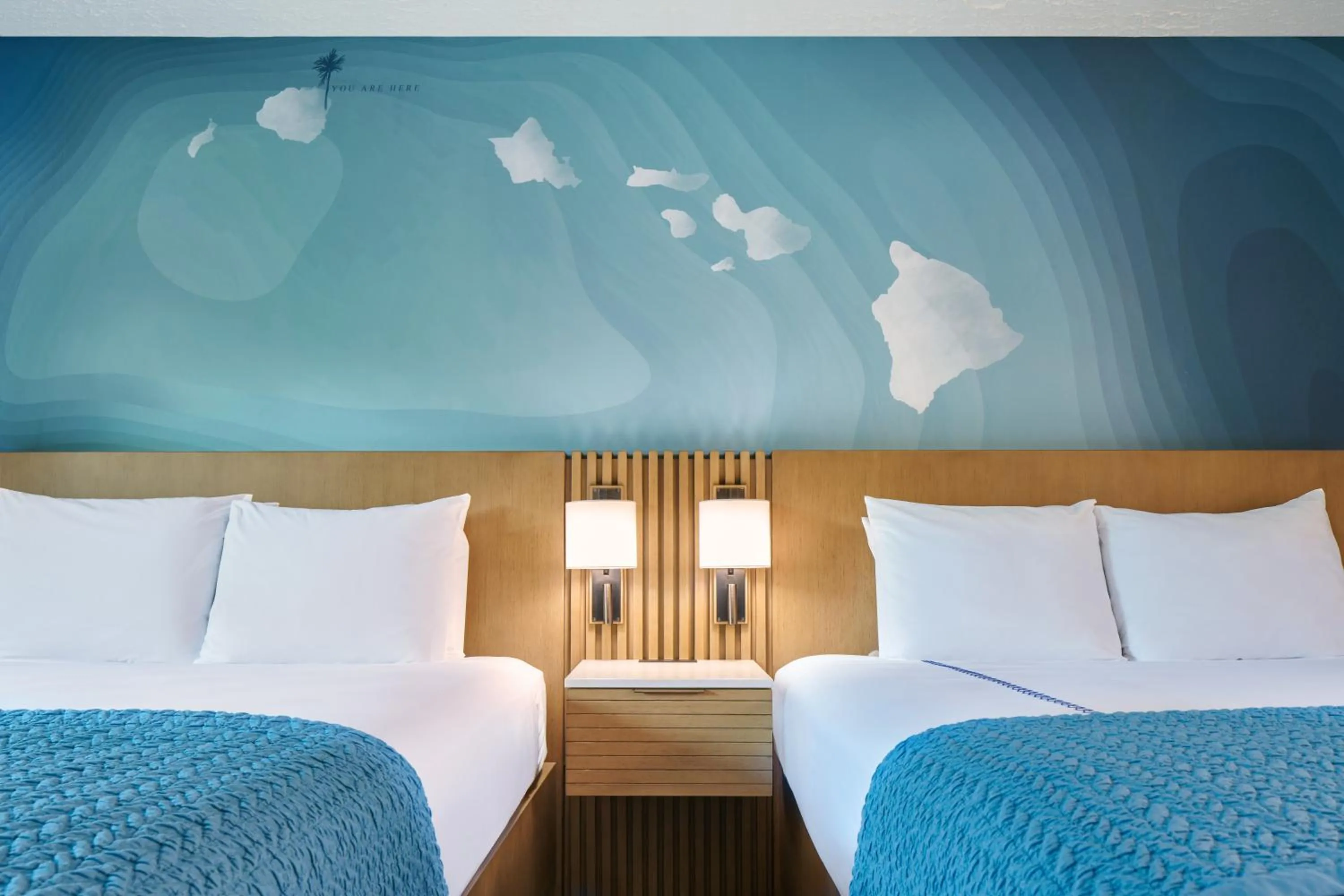 Bed in Kauai Shores Hotel