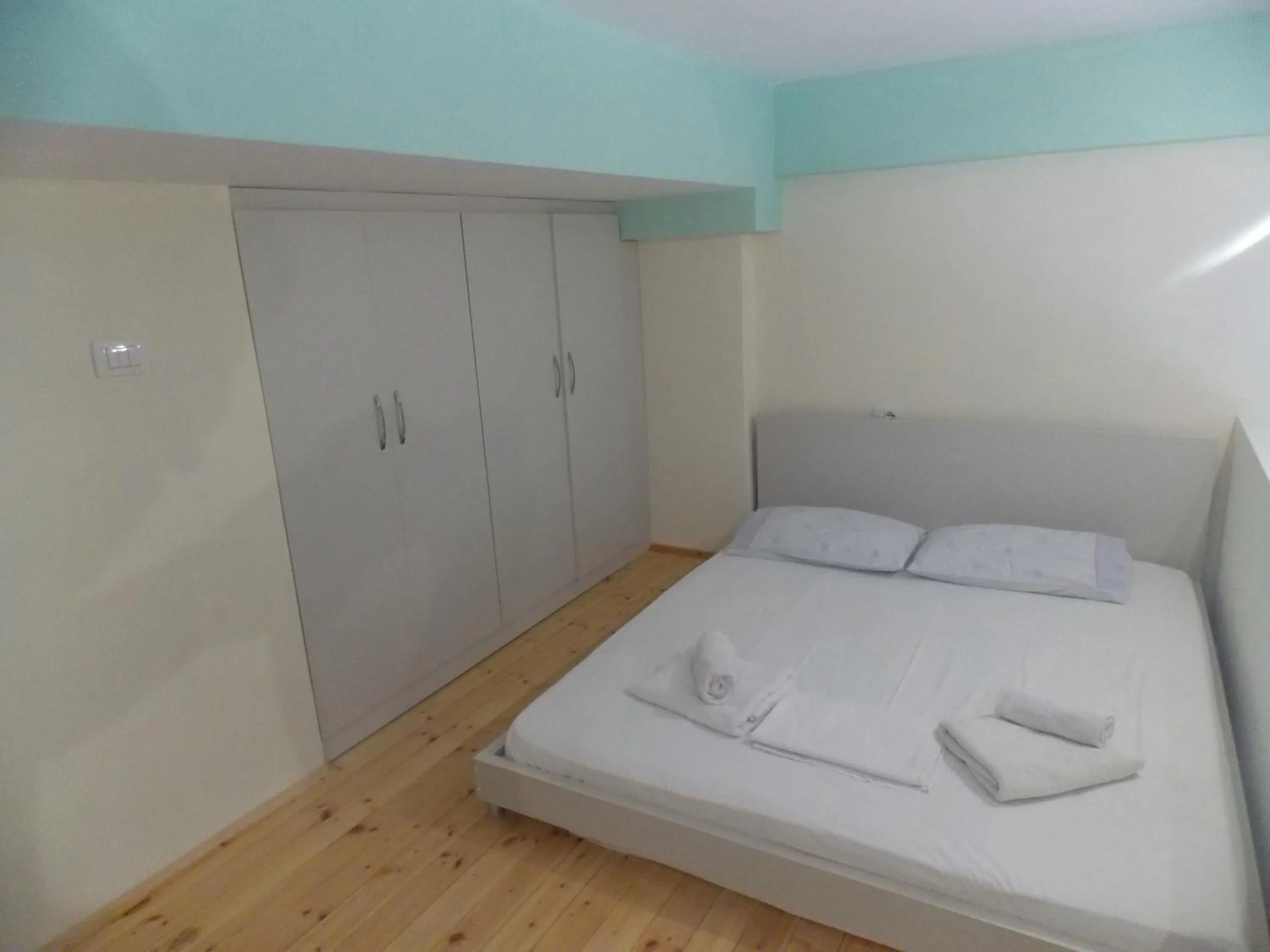Bed in Angela Apartments