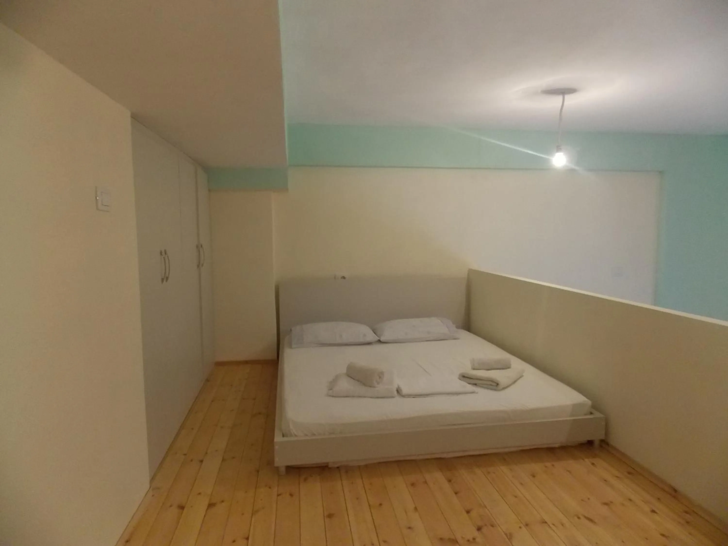 Bed in Angela Apartments