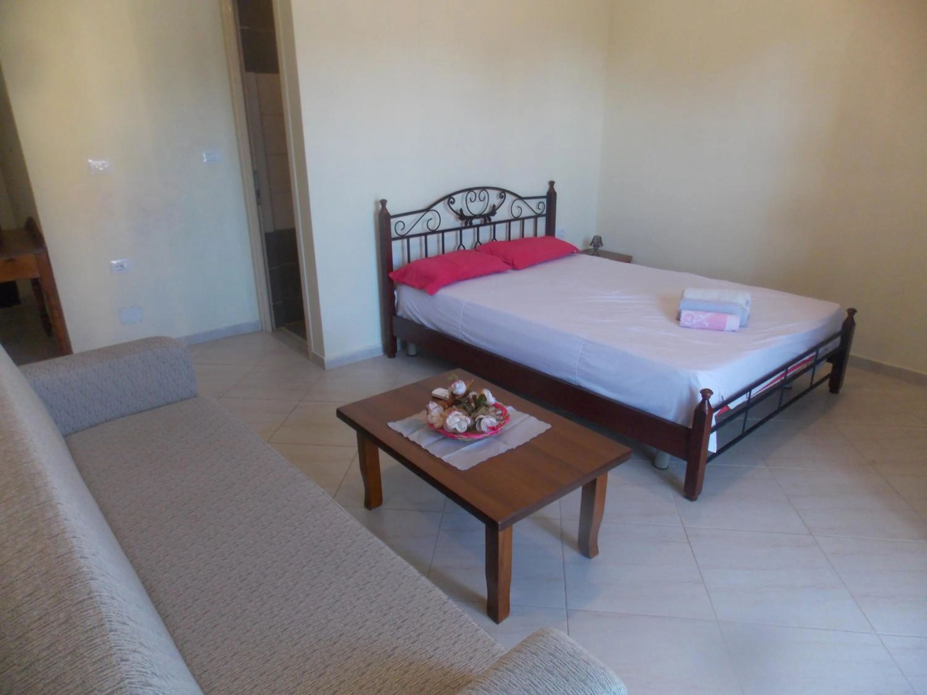 Bed in Angela Apartments