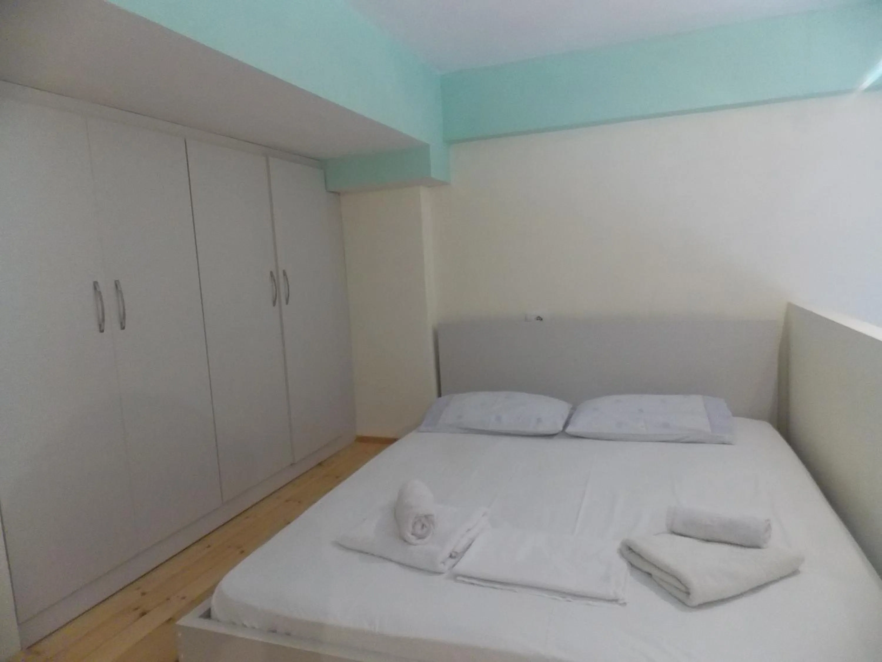 Bed in Angela Apartments