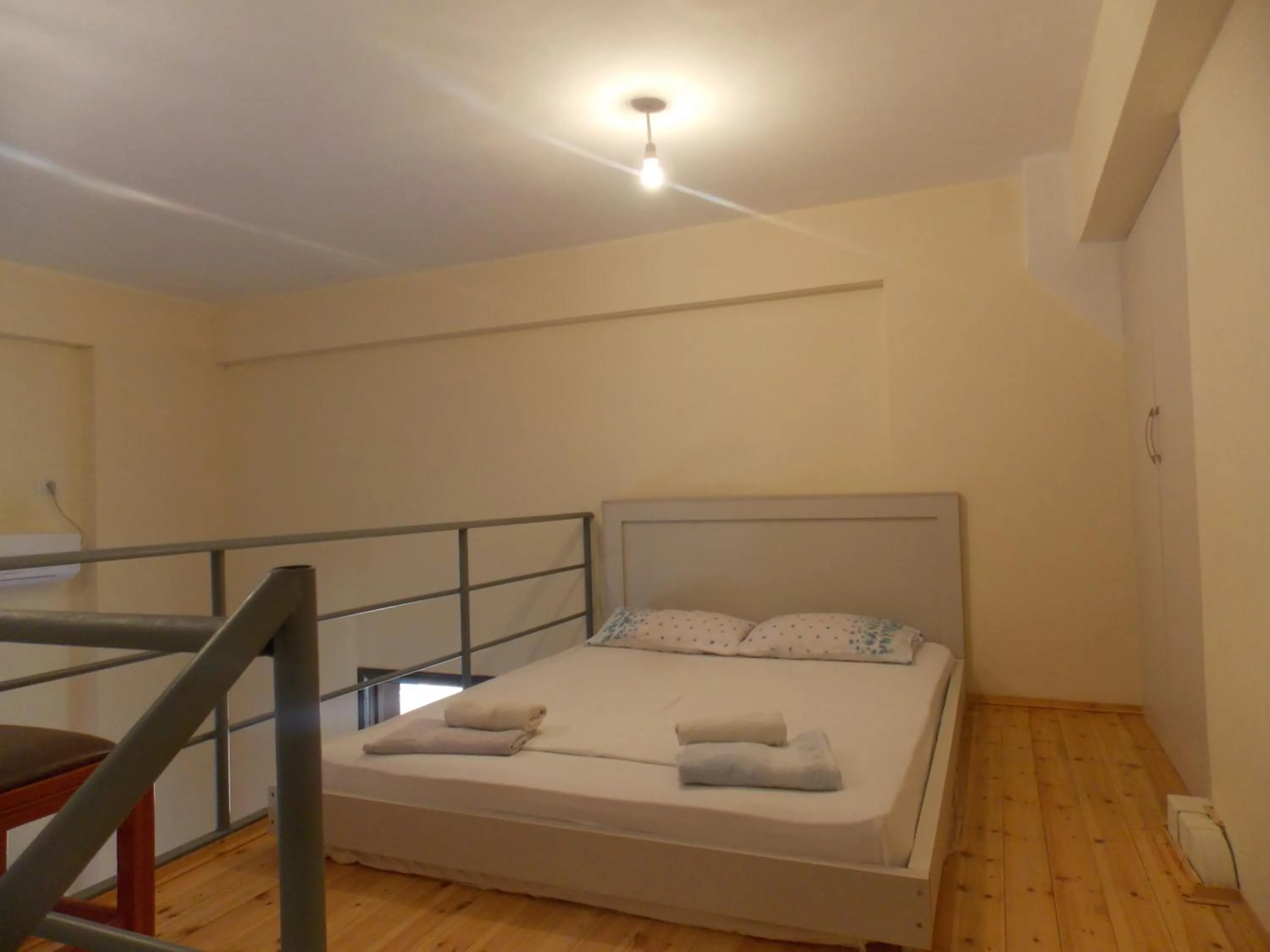 Bed in Angela Apartments