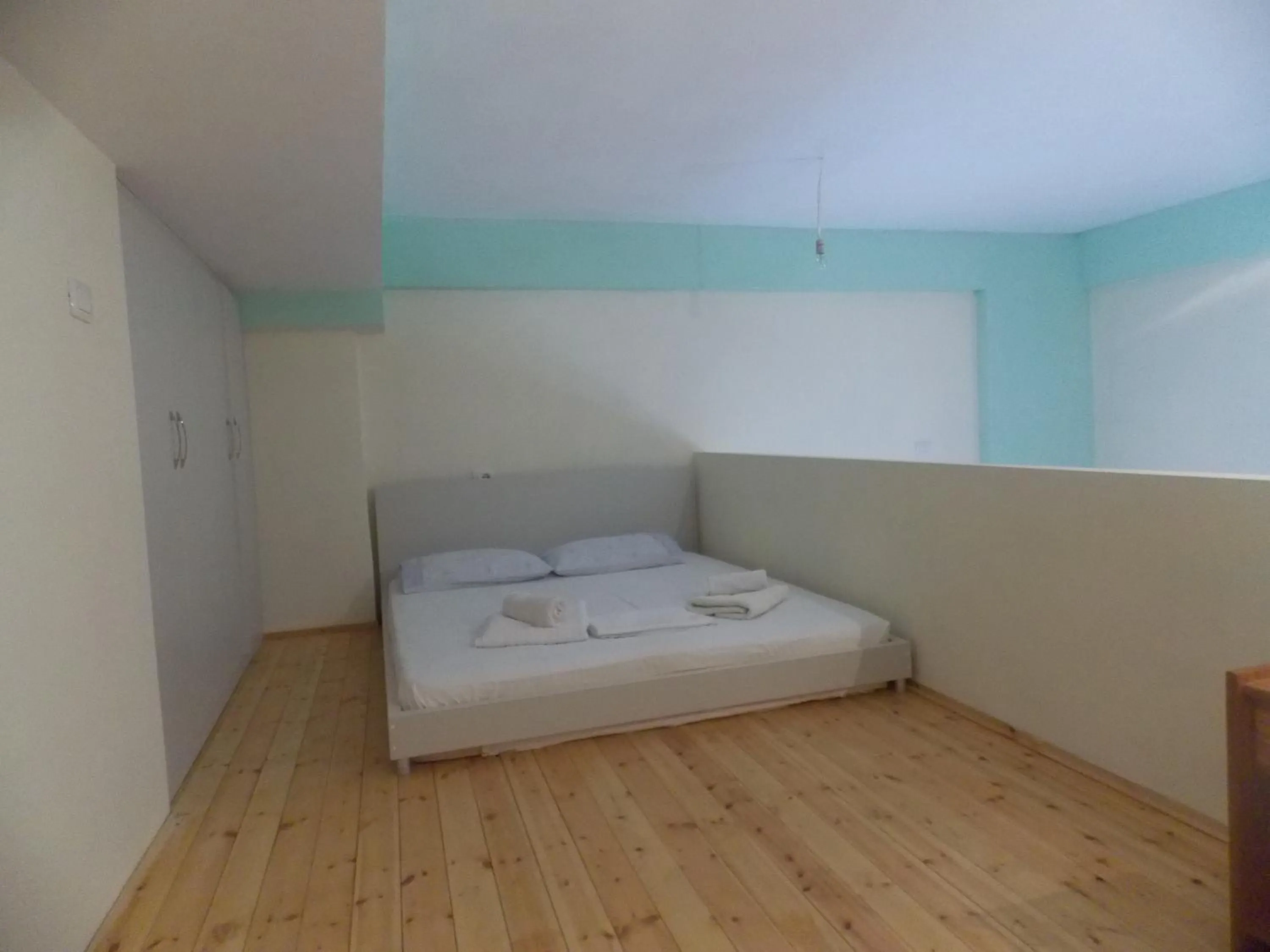 Bed in Angela Apartments