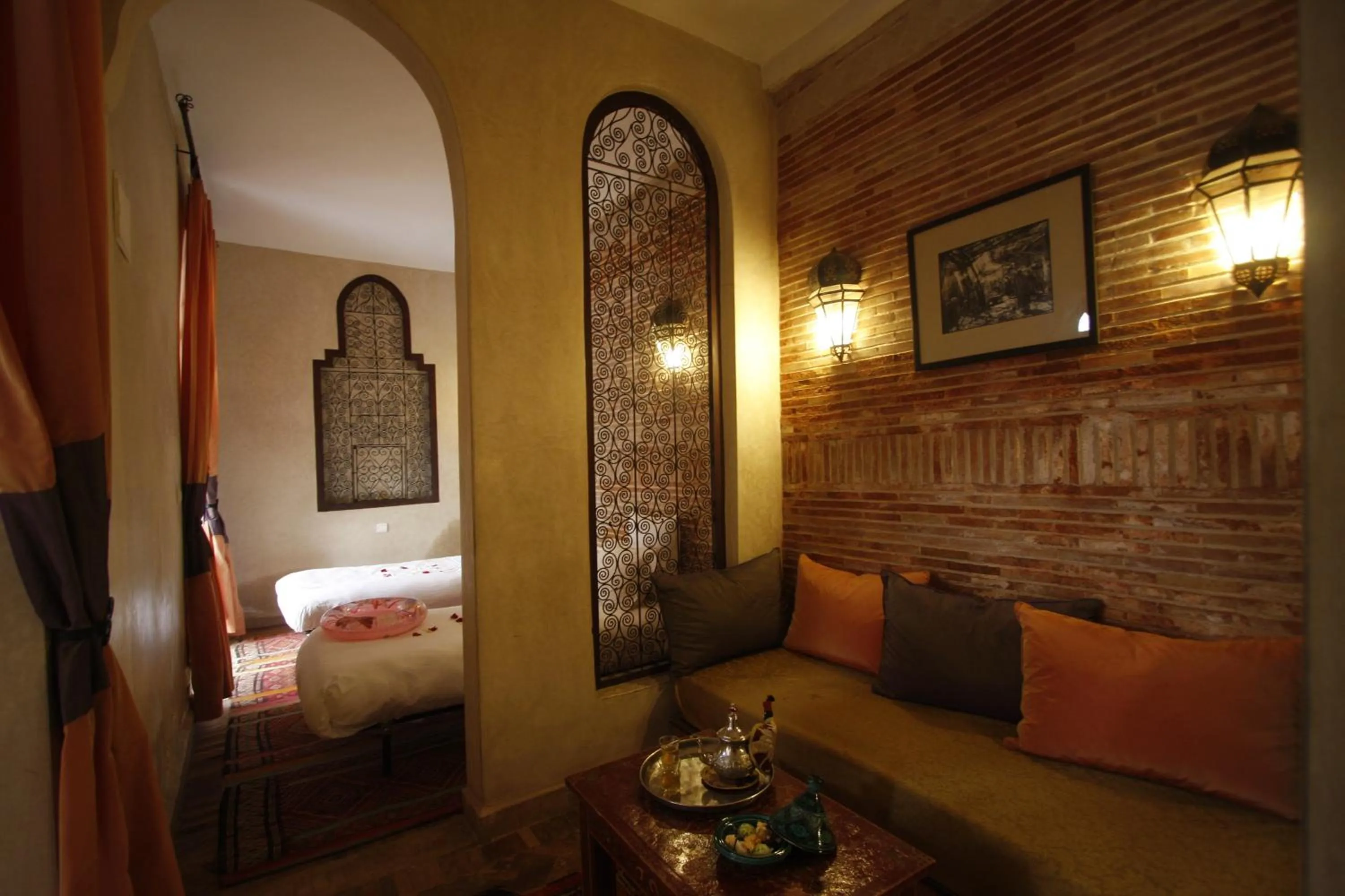 Seating area, Bed in Riad Léna & Spa