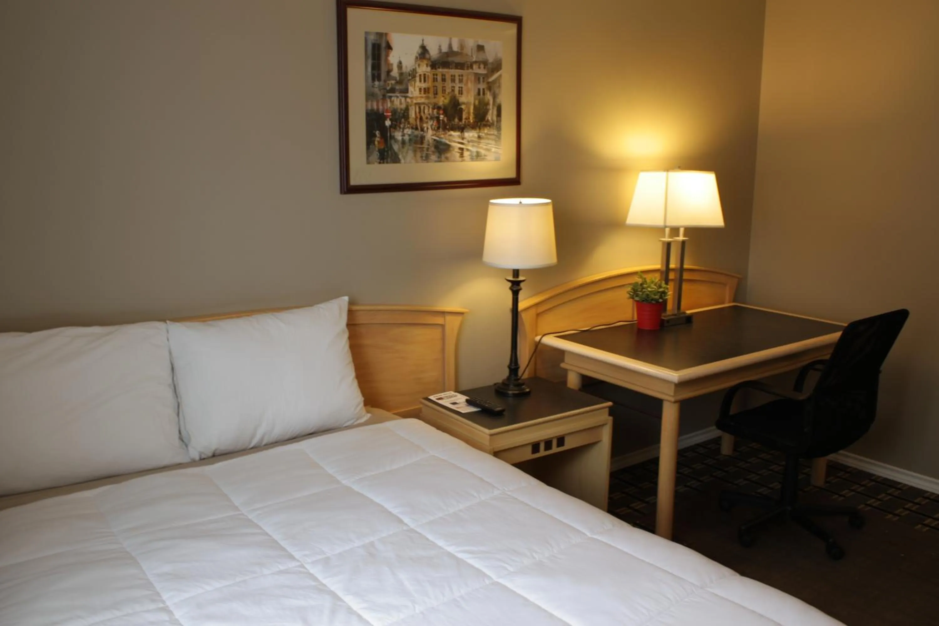 Bed in Hillcrest Motel