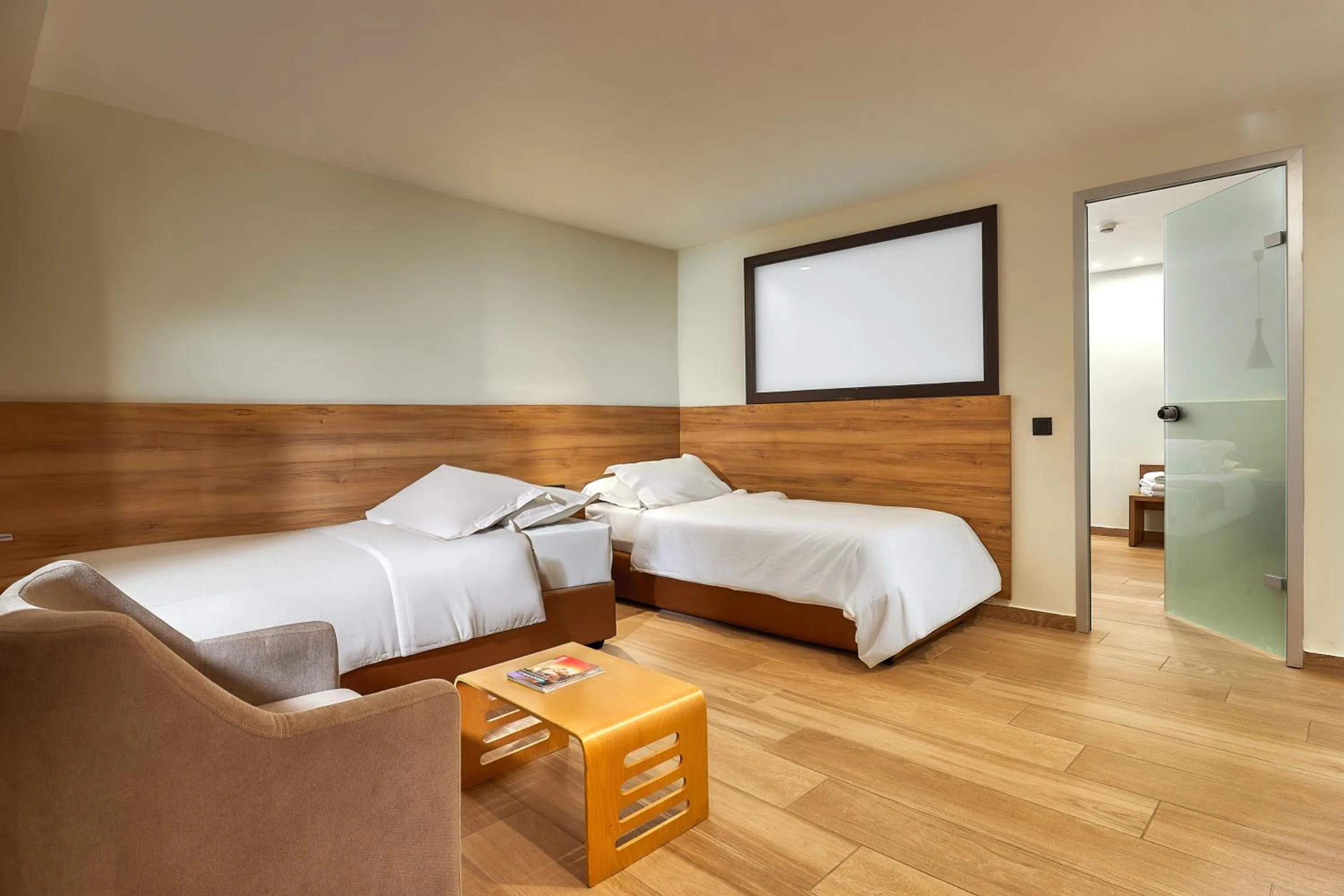 Bed in Dionisos Hotel