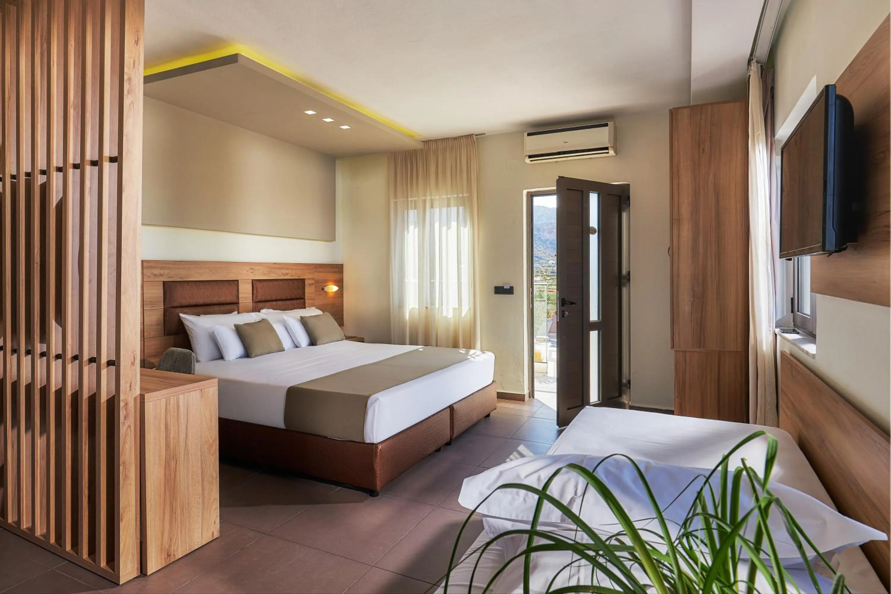 Bed in Dionisos Hotel