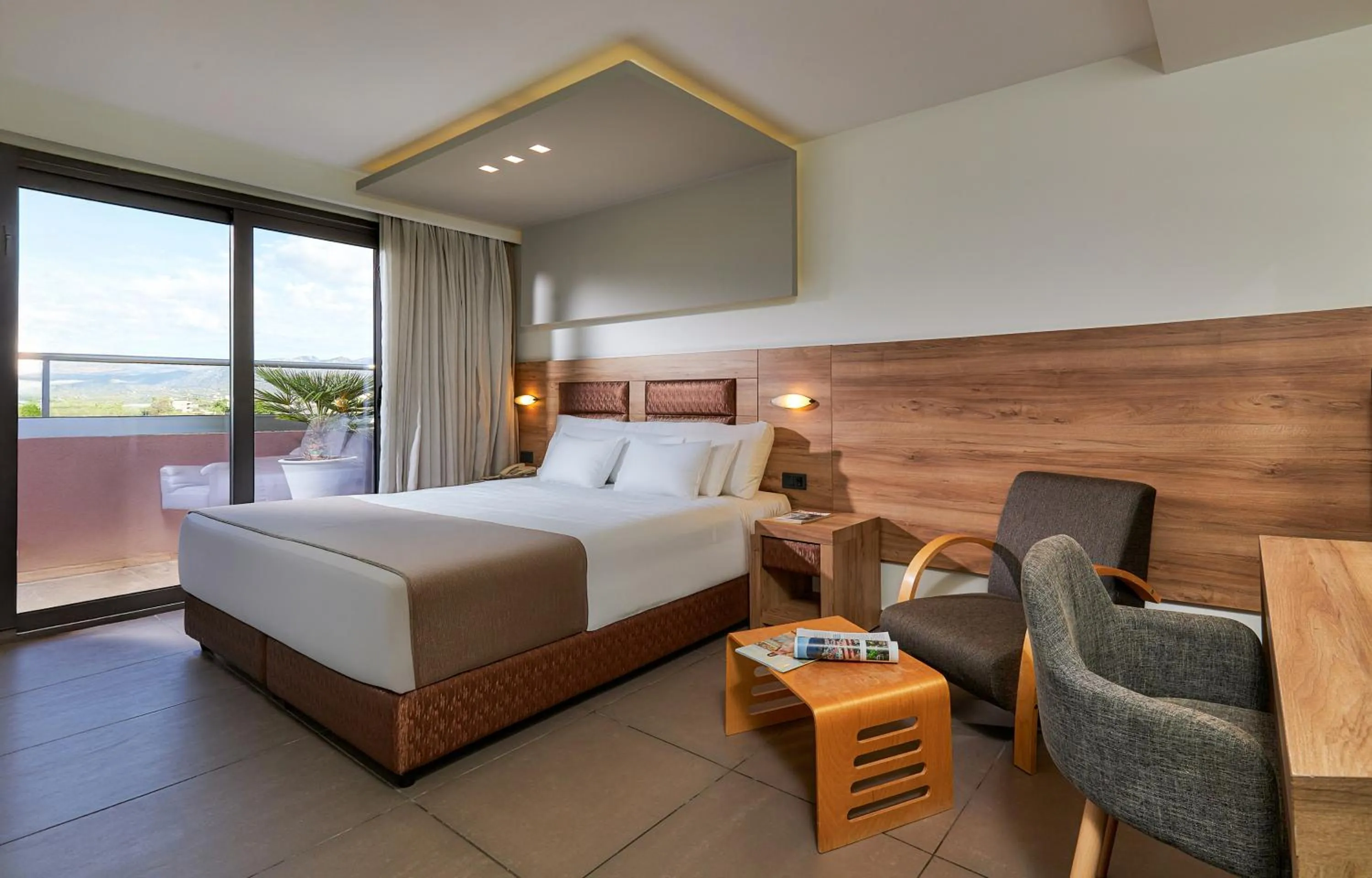 Bed in Dionisos Hotel