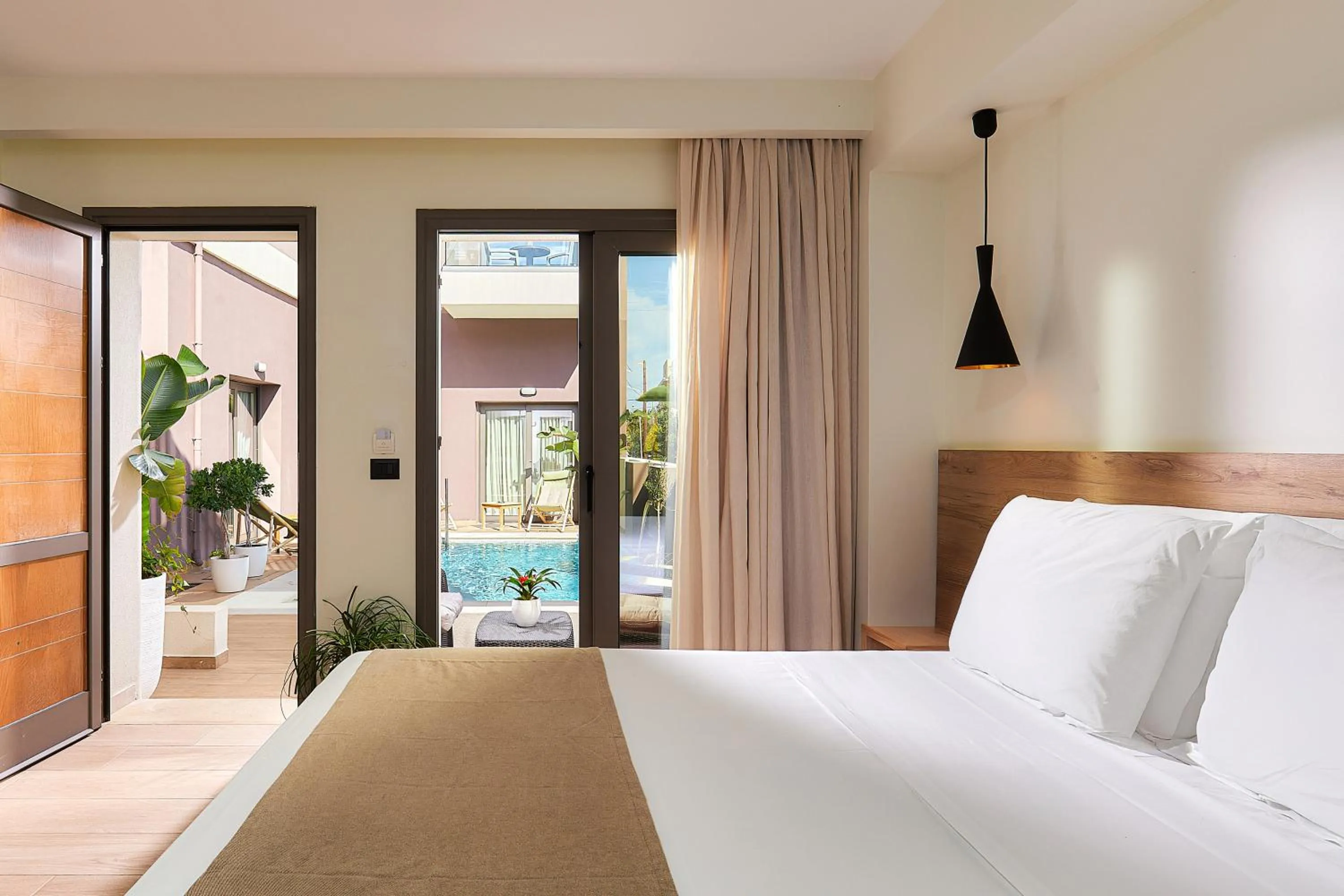 Bed in Dionisos Hotel