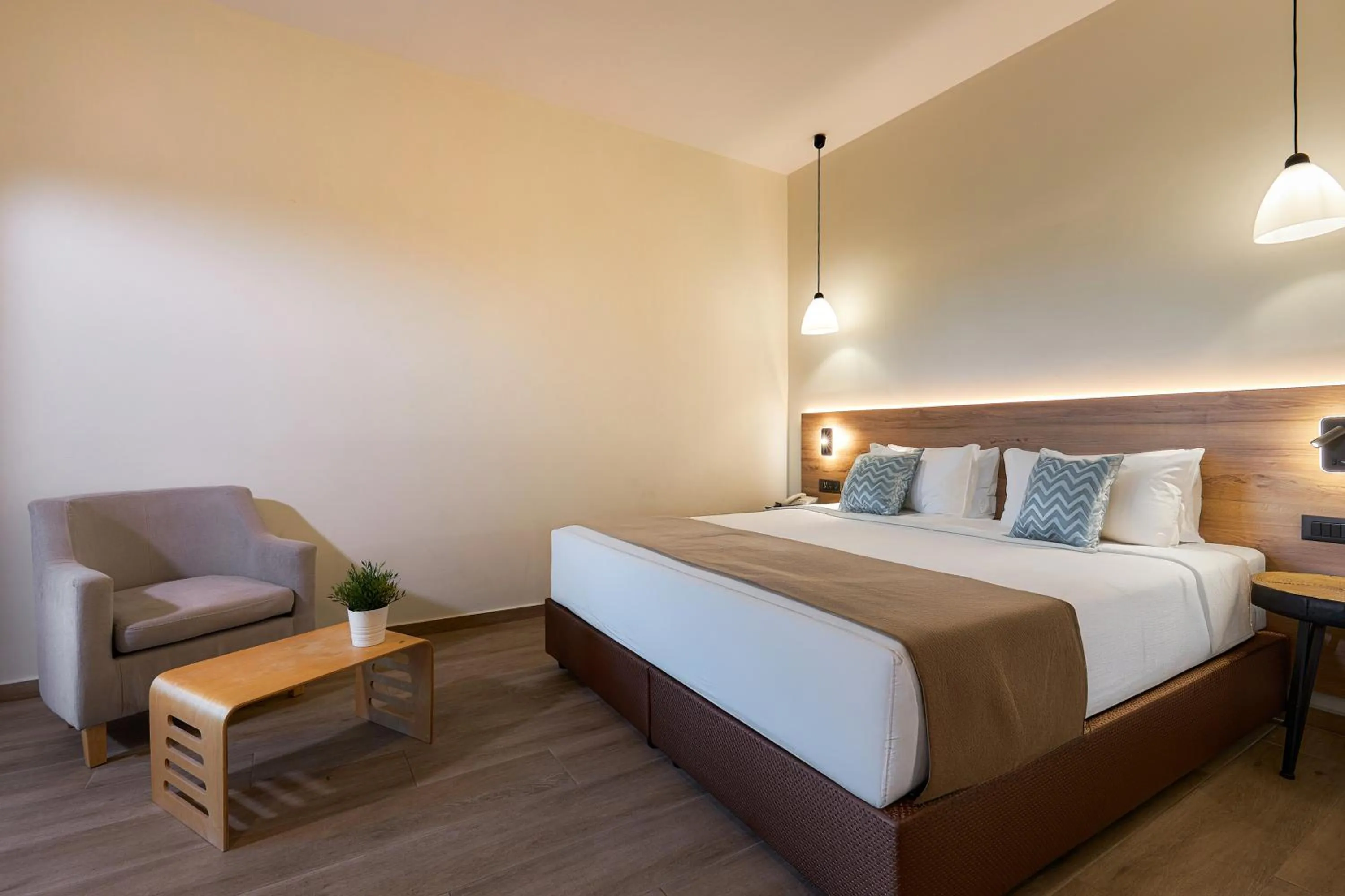 Bed in Dionisos Hotel