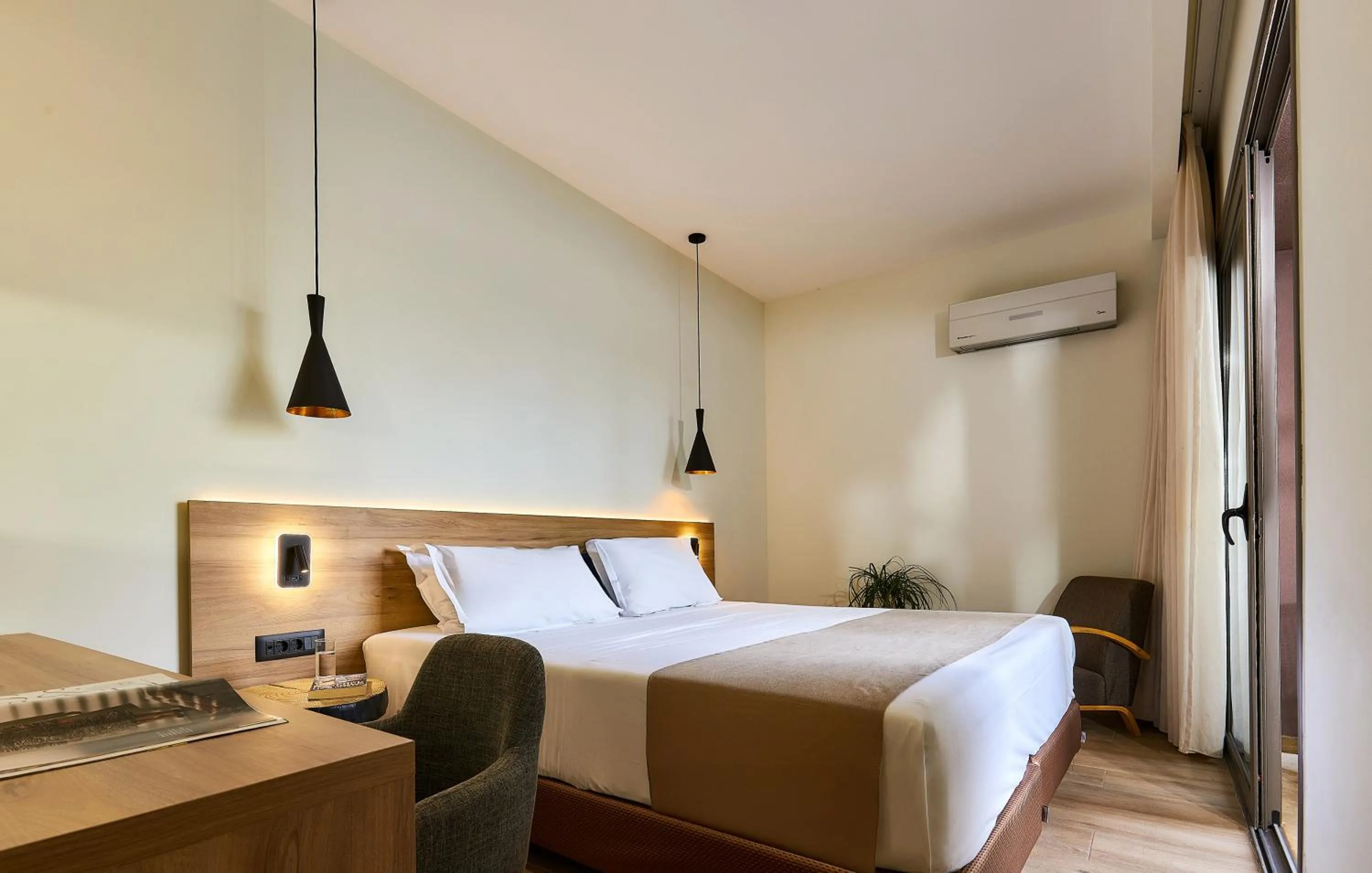 Bed in Dionisos Hotel