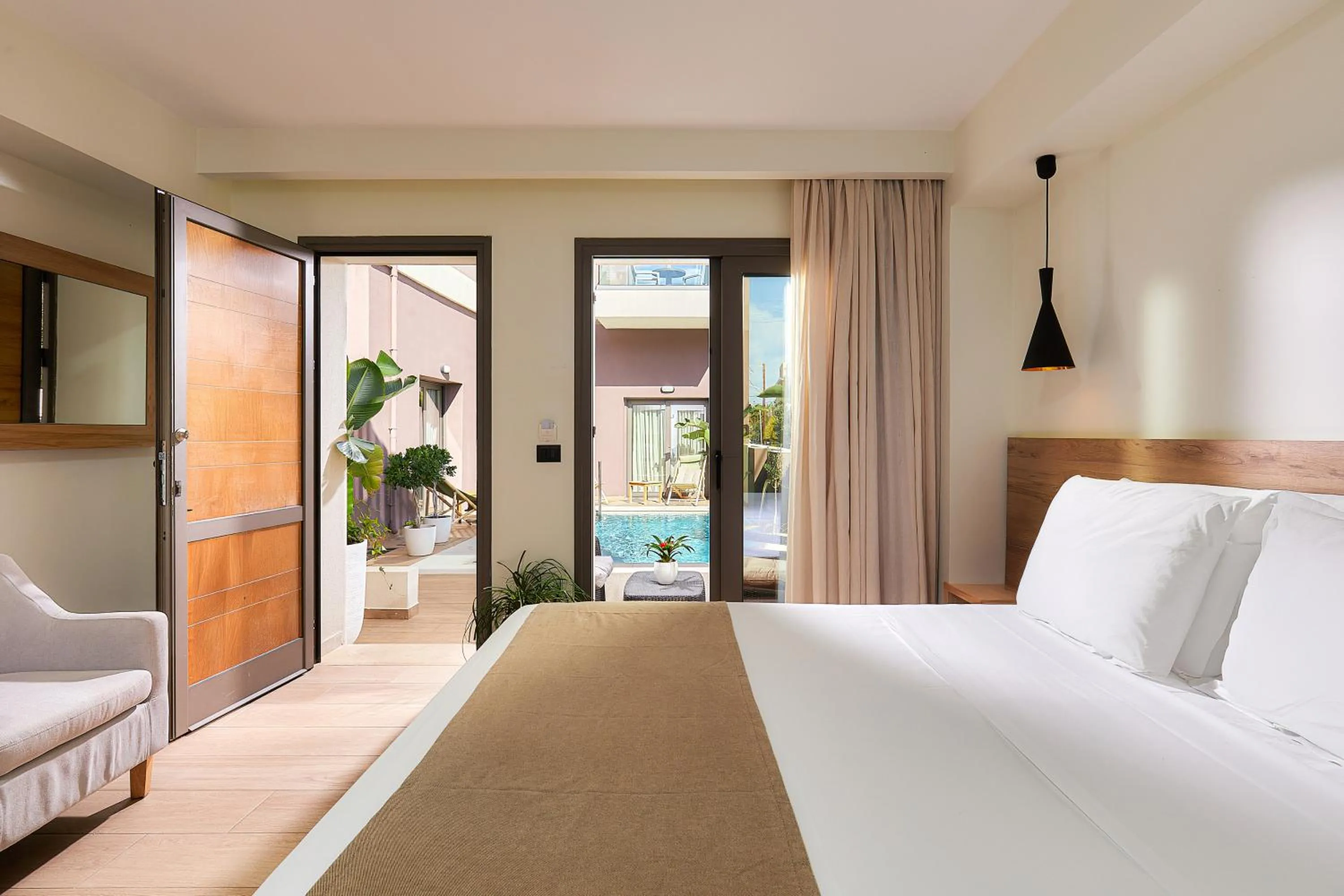 Bed in Dionisos Hotel