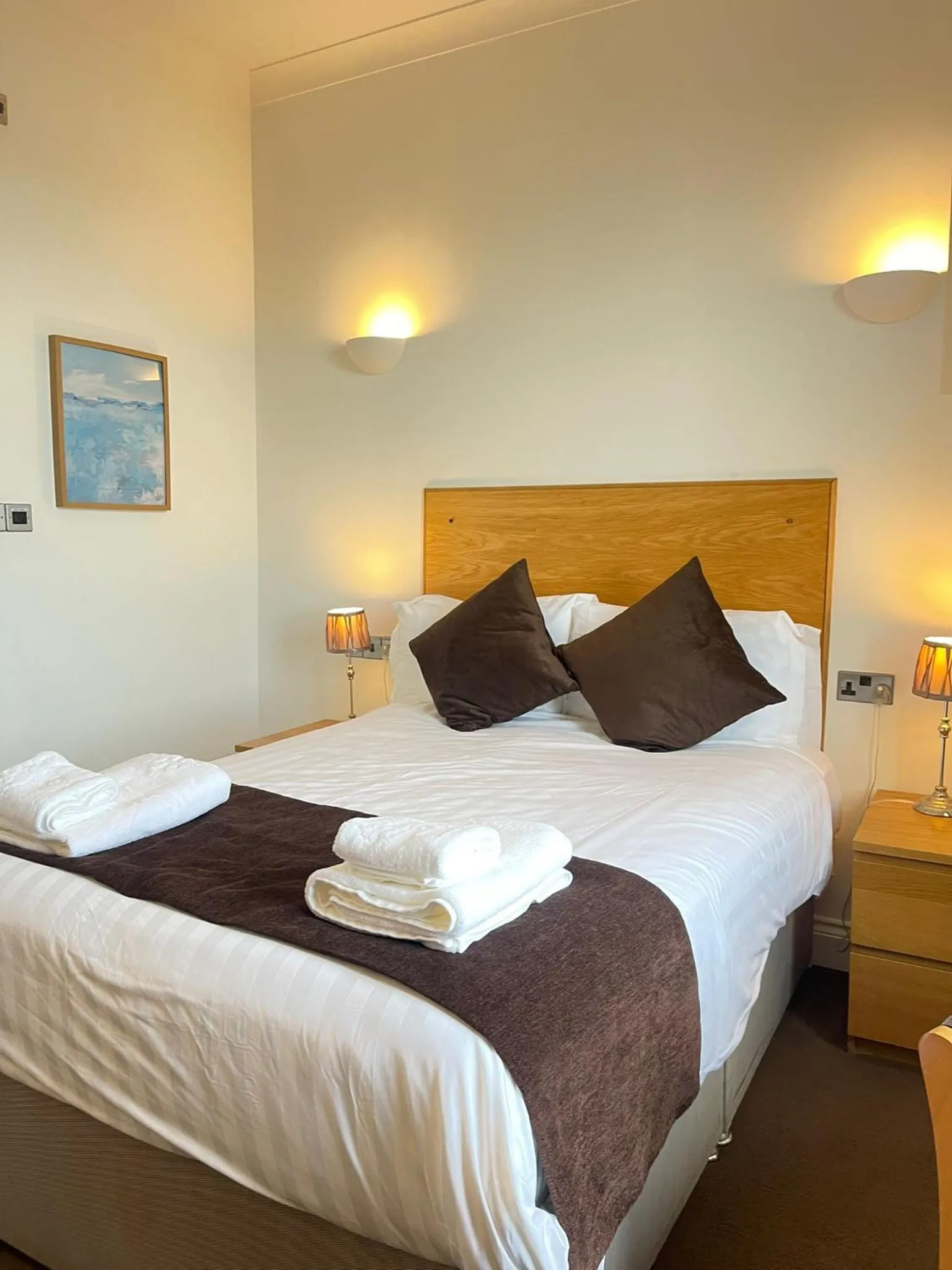 Bed in Four Saints Brig Y Don Hotel