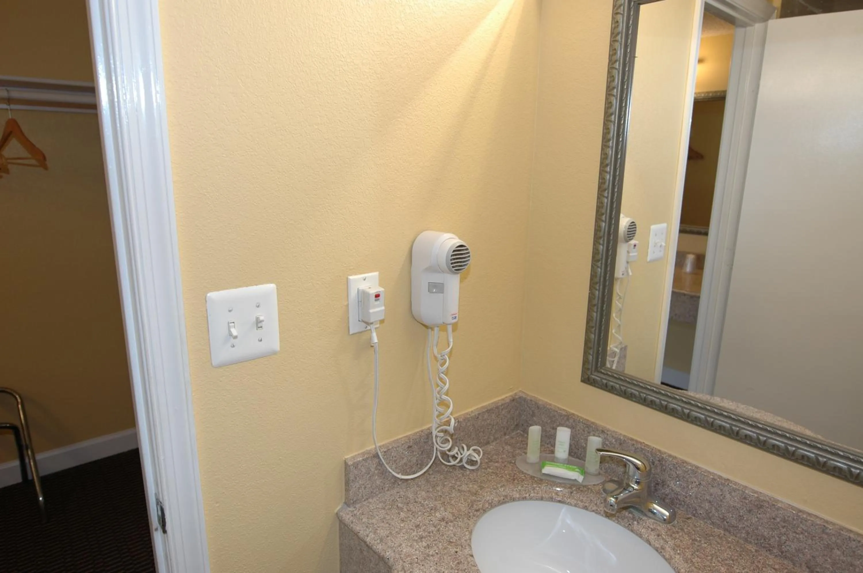 Bathroom in Ambassadors Inn & Suites