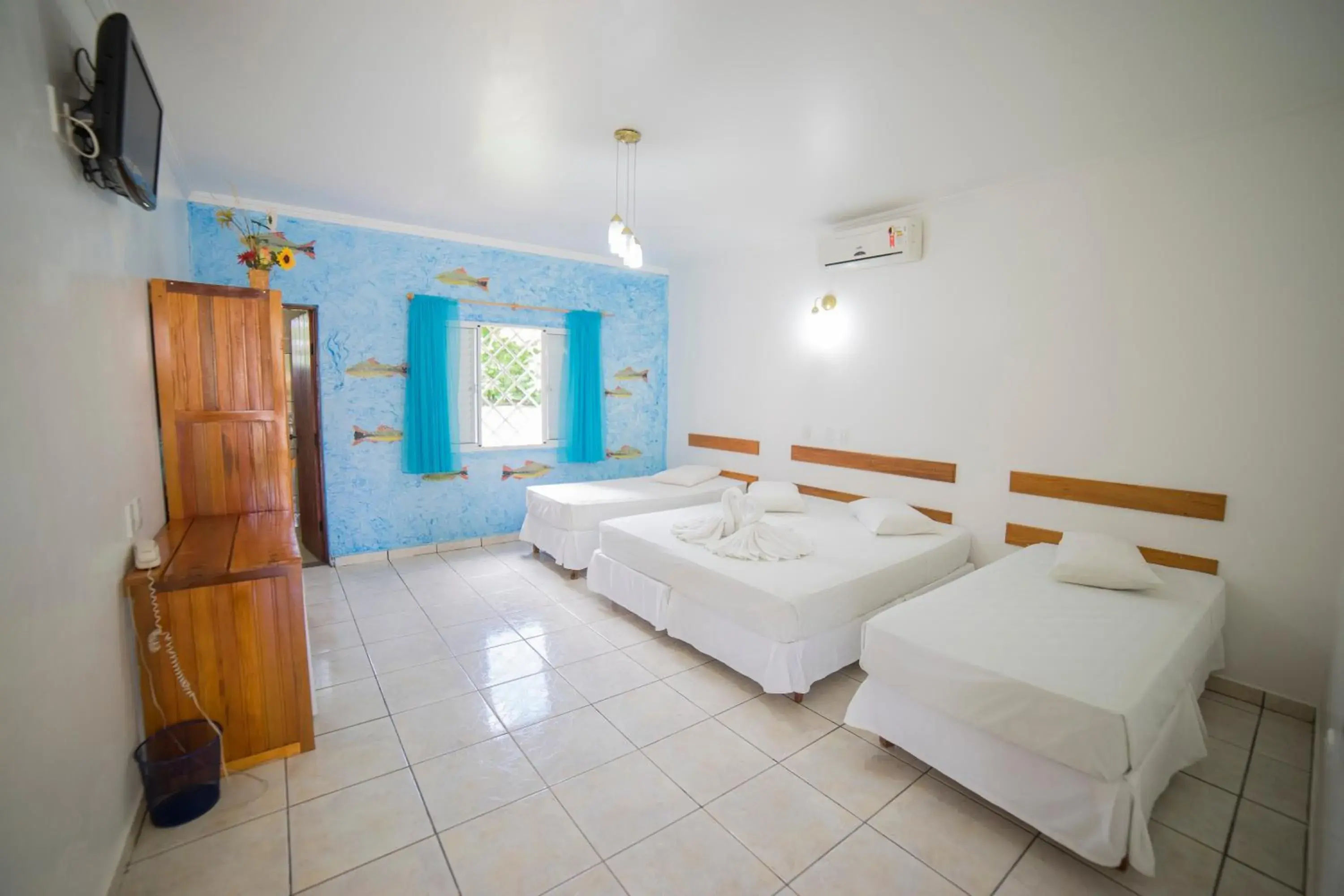 Standard Quadruple Room in Hotel Pousada Arauna Standard Quadruple Room in Hotel Pousada Arauna