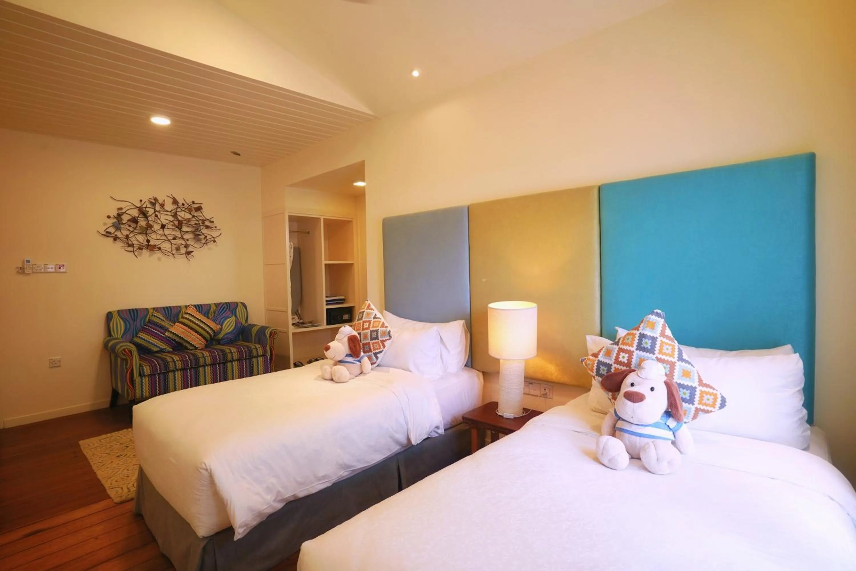 Bed in Sutera Sanctuary Lodges At Manukan Island