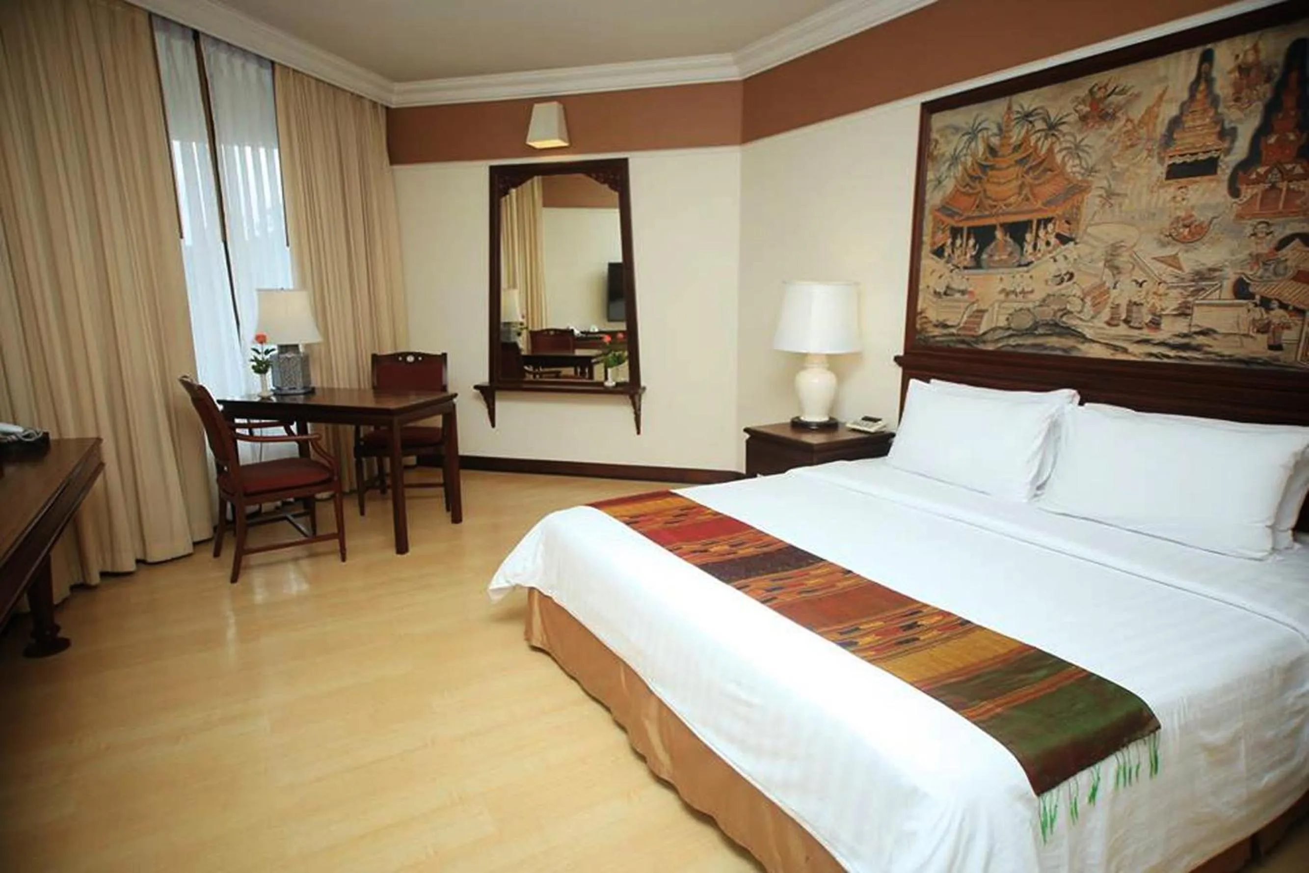 Bed in Wiang Inn Hotel