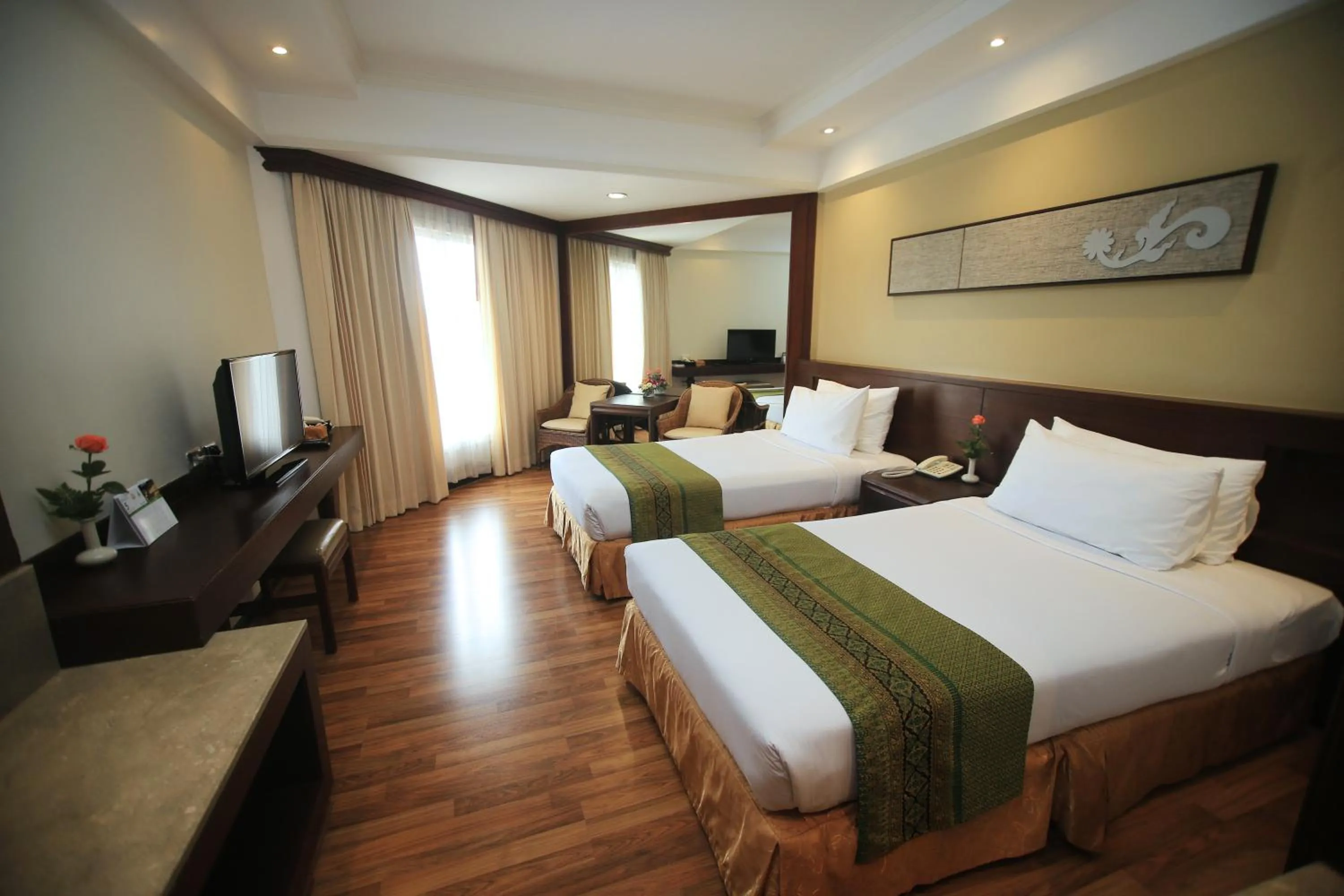 Bed in Wiang Inn Hotel
