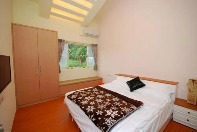 Bed in The house behind stream