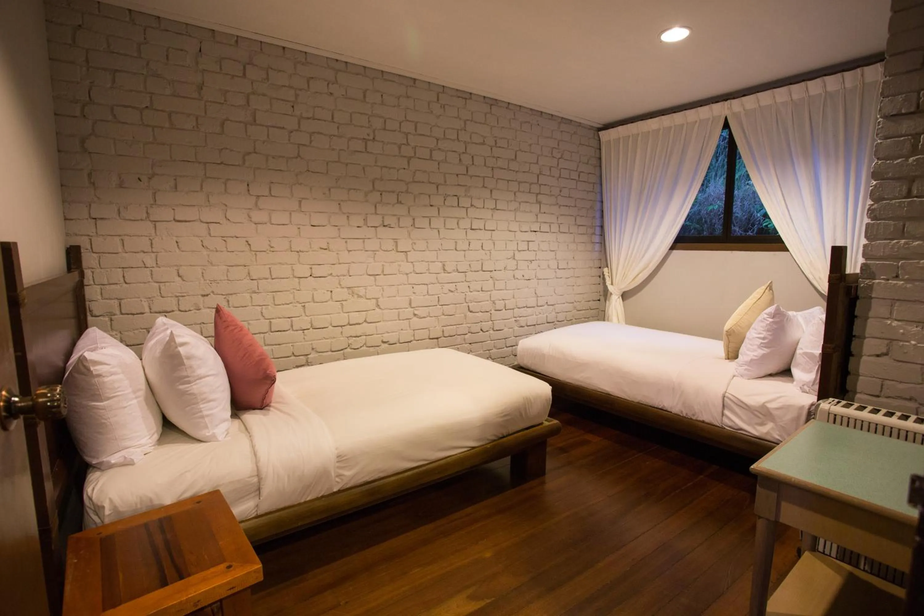 Bed in Sutera Sanctuary Lodges At Kinabalu Park