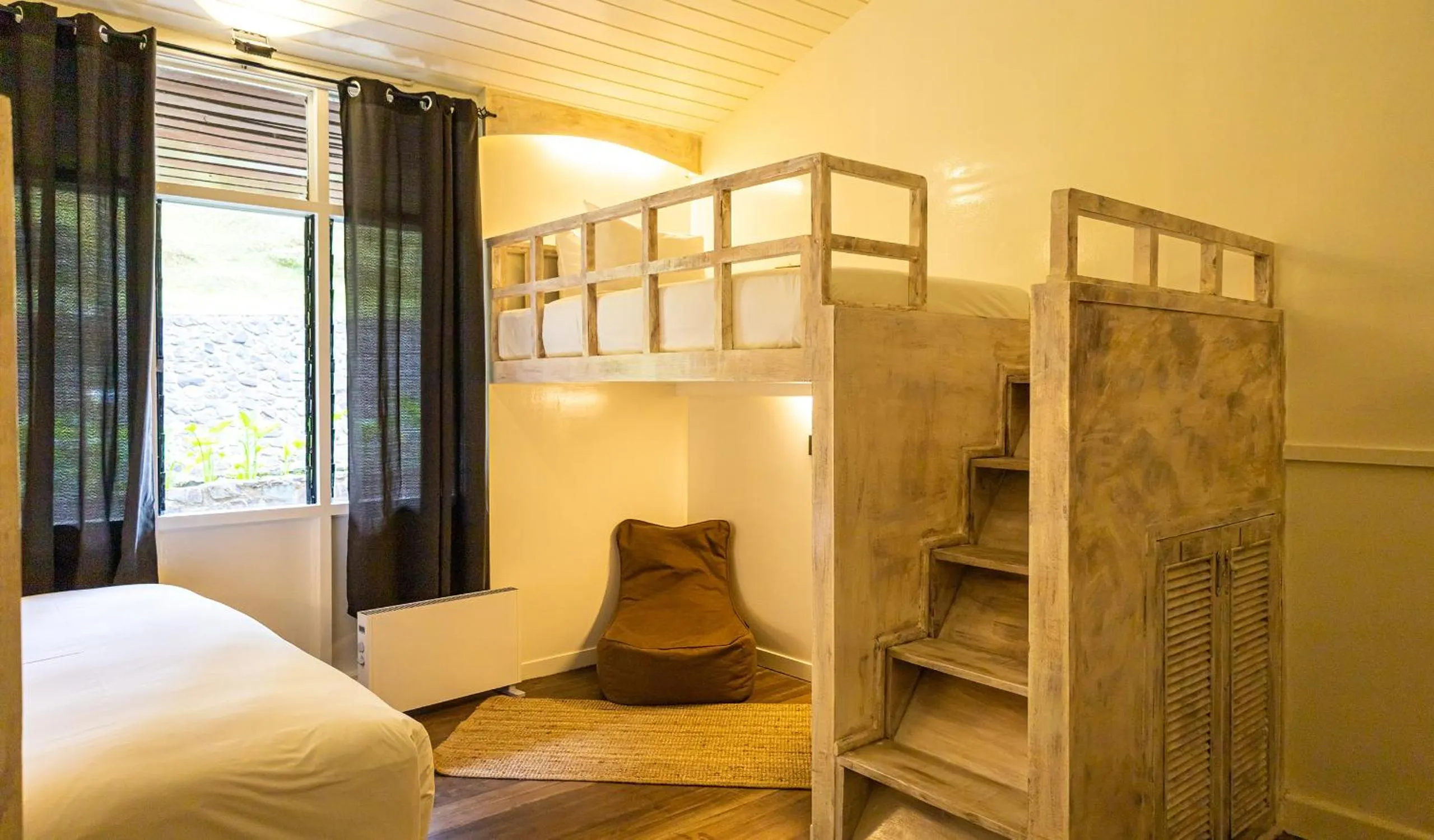 Bed in Sutera Sanctuary Lodges At Kinabalu Park